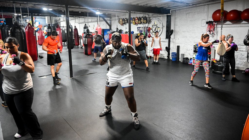 Boxing fundamentals fitness class shadow boxing