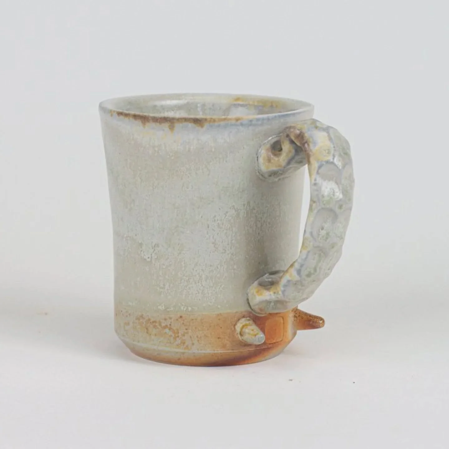 Back from the @ouceramics conference and here is one of my favorite cups from the 8 kilns I had work go into. Spending hot summer days feeding wood into kilns is a labor of love. This conference was so unique and one of my favorite experiences. It wa