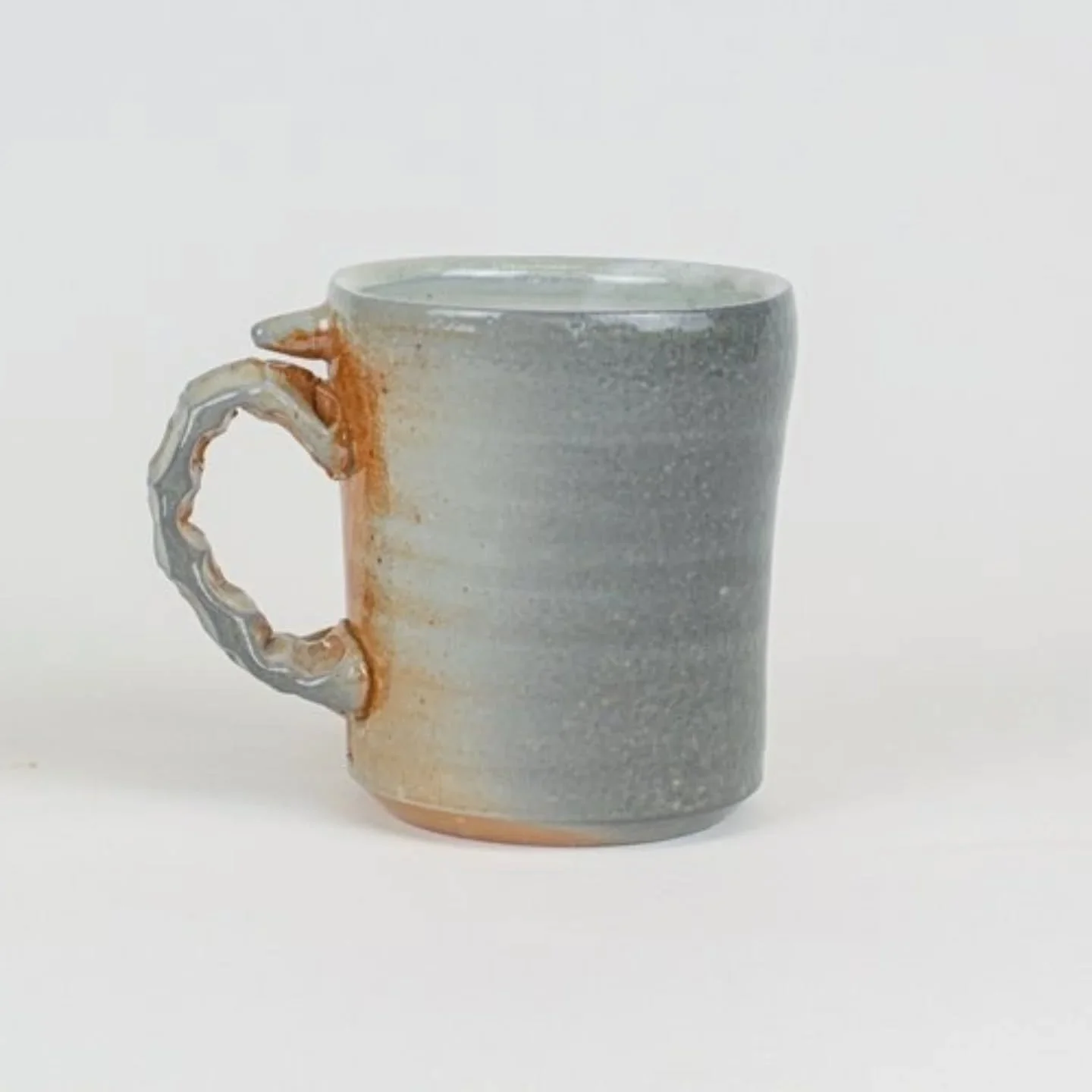 Back from the @ouceramics conference and here is one of my favorite cups from the 8 kilns I had work go into. Spending hot summer days feeding wood into kilns is a labor of love. This conference was so unique and one of my favorite experiences. It wa