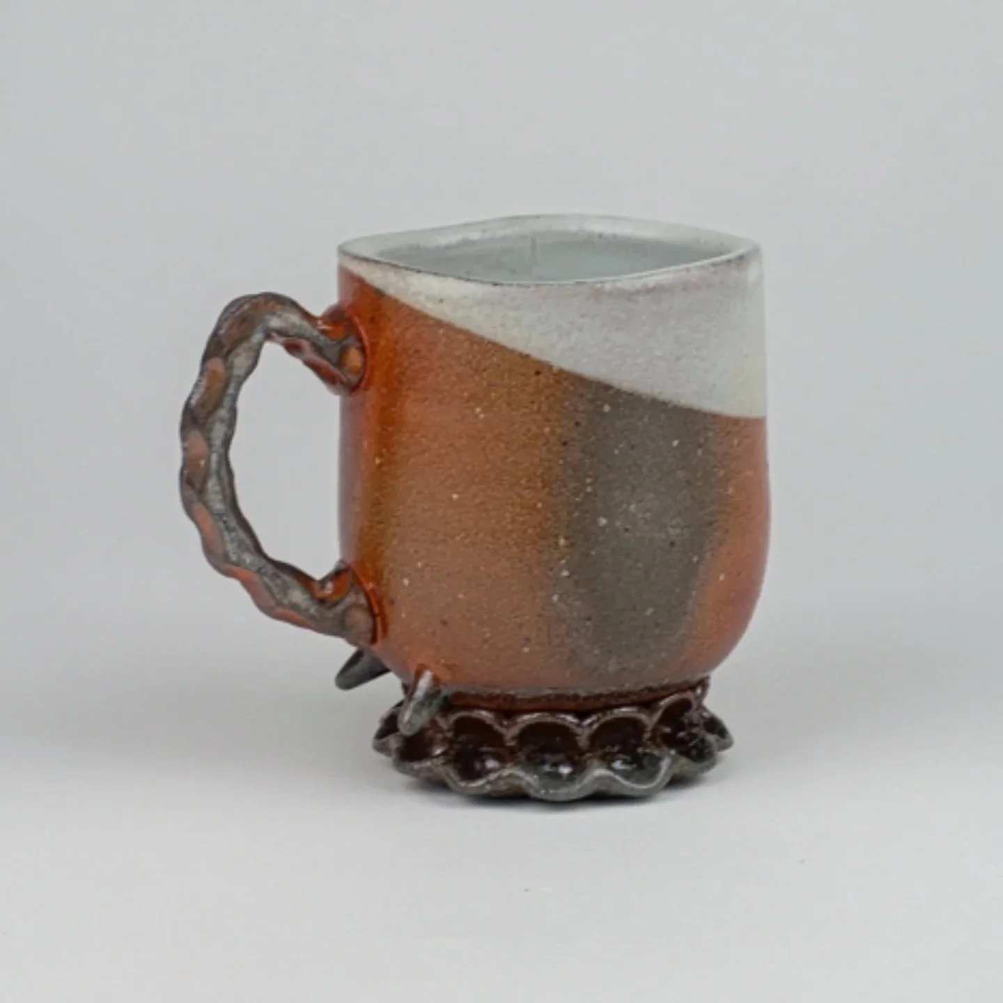One of the mugs I made and soda fired this summer while doing a ceramics residency @etsuartanddesign . Excited to continue to treat this form and fine tune it.