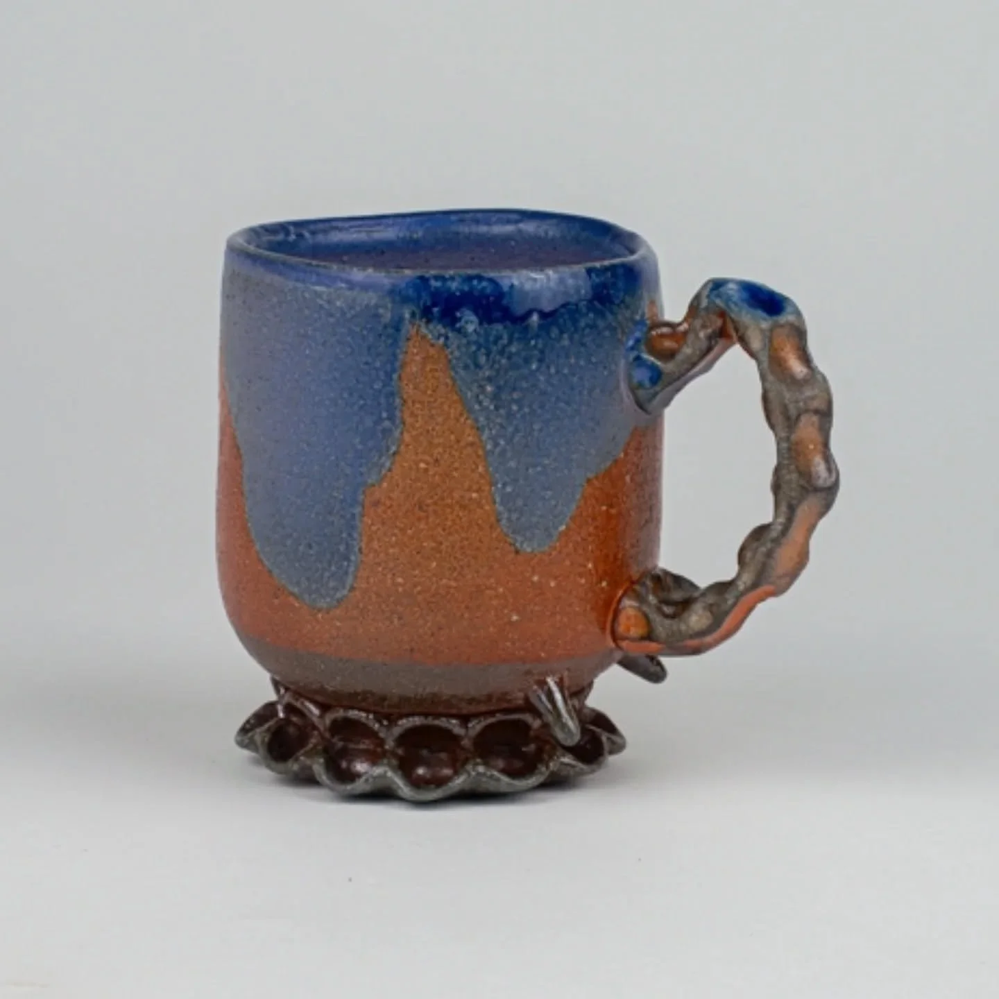One of the mugs I made and soda fired this summer while doing a ceramics residency @etsuartanddesign . Experimented with light texture and a purple glaze over the flashing slip on this one.