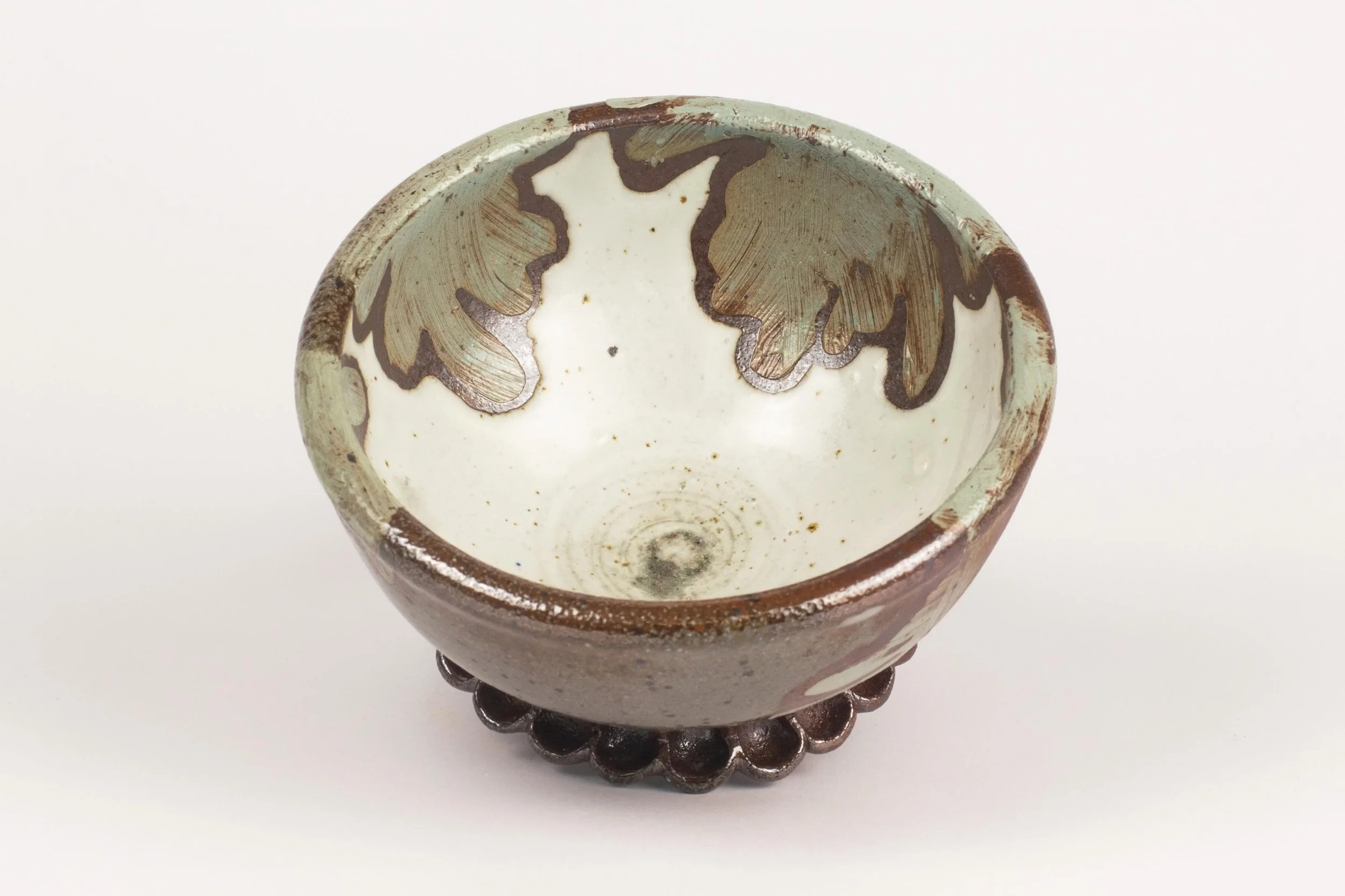 A bowl experiment from the last soda firing. I like the contrast between the brighter inside and darker outside.
