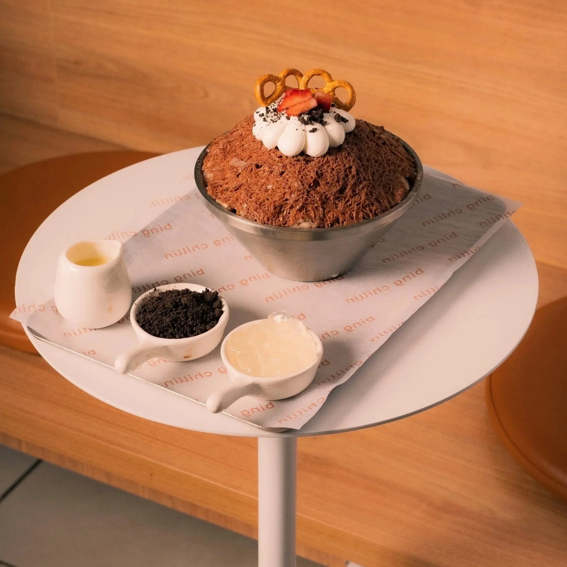 Chocolate bingsu — chocolate shaved ice with condensed milk, Oreo crumbs and white pearls