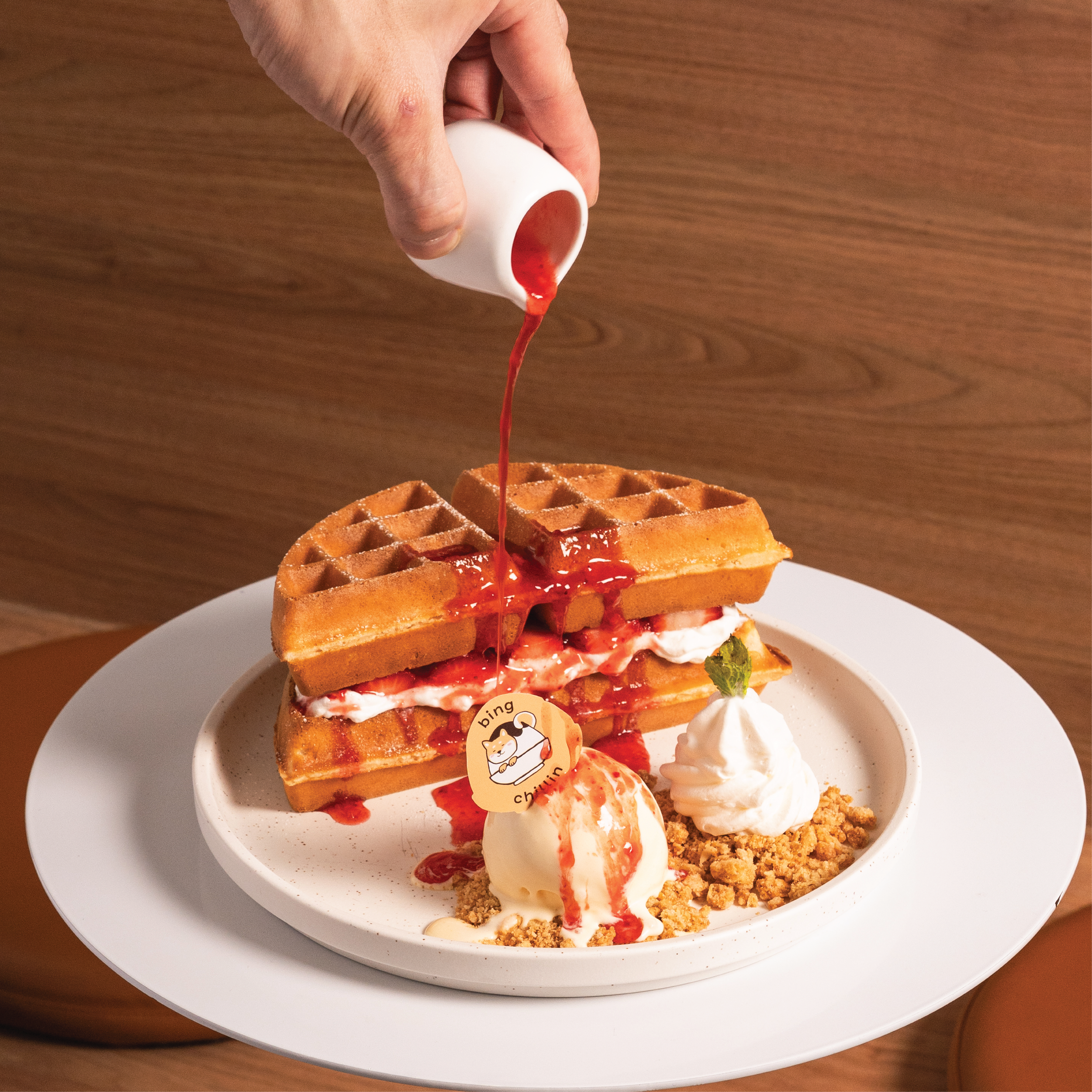 Strawberry Jam waffle with fresh strawberries, whipped cream and strawberry jam