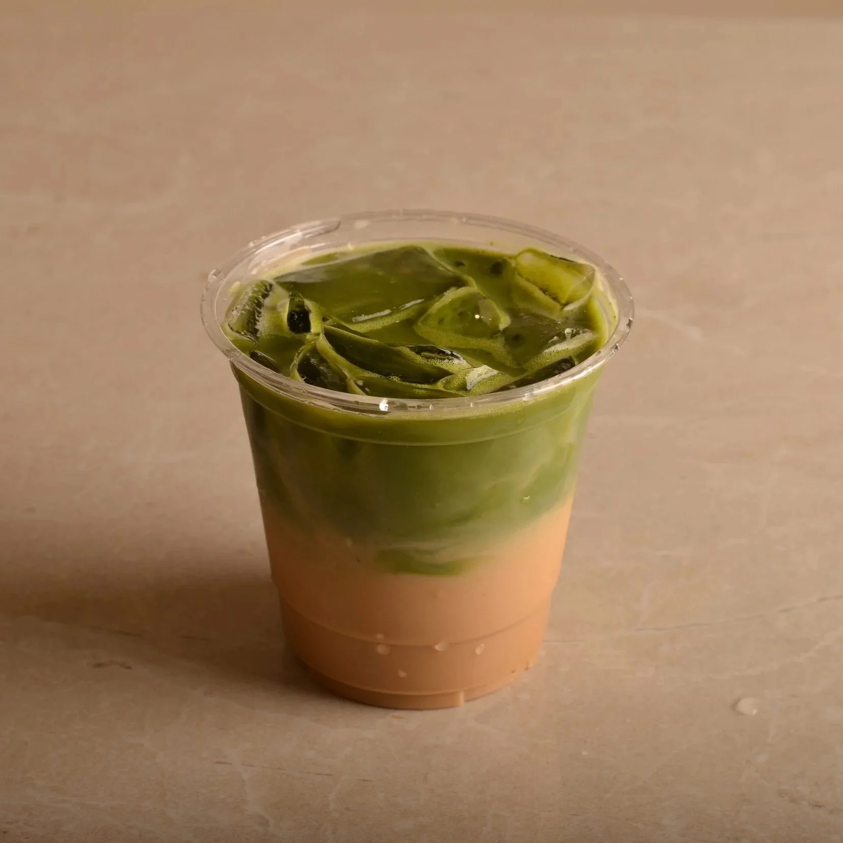 Iced coffee matcha with espresso, matcha, milk and ice