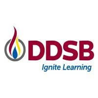 Logo for the Durham District School Board with the motto 'Ignite Learning'. The logo is a stylized candle flame with red, blue, and yellow.