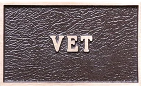 bronze plaque painted a light brown