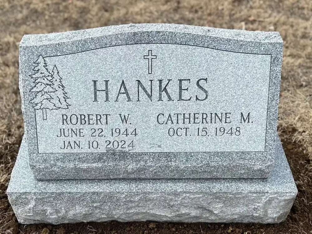 slant headstone with rocky top, sides