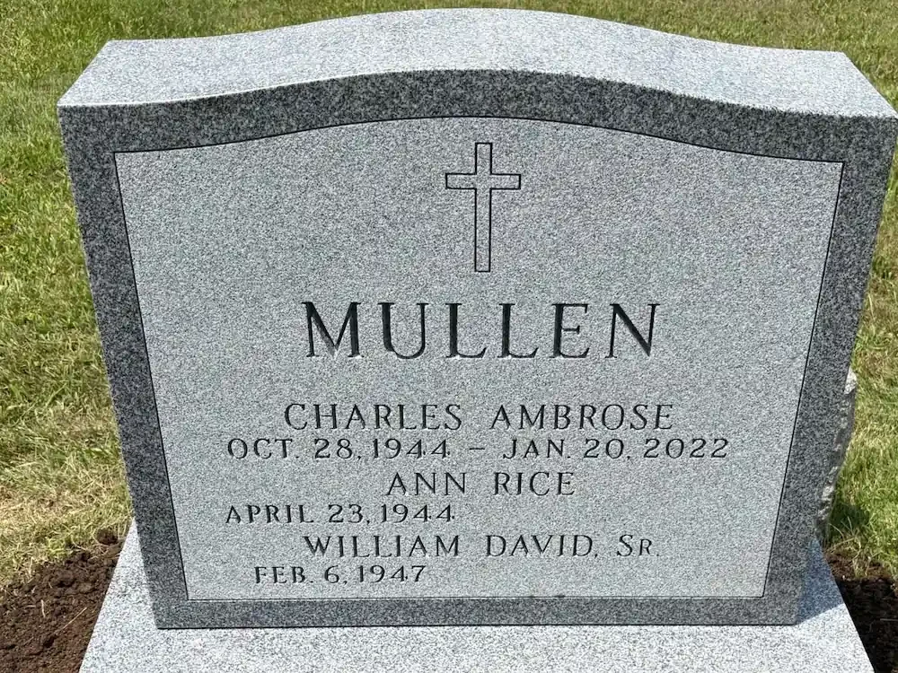headstone showing one large panel with a polished border