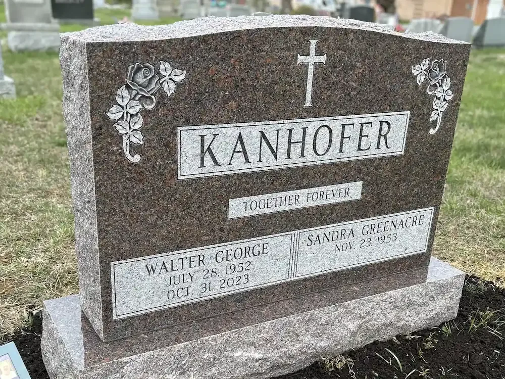 headstone with a rocky top and rocky sides
