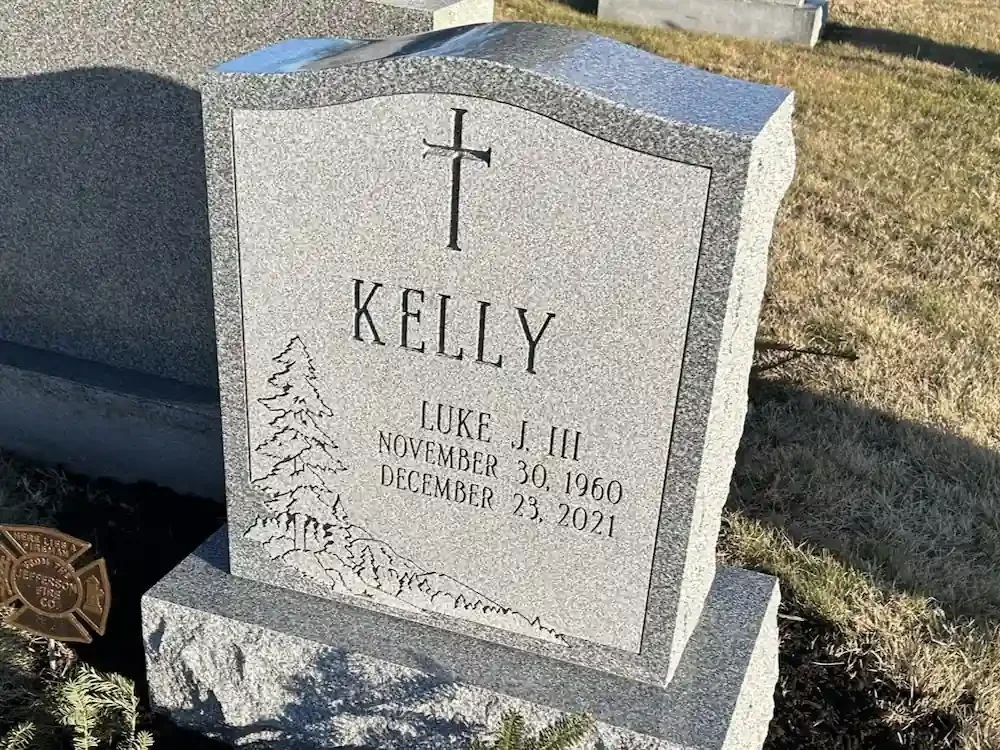 headstone with a polished top and rocky sides