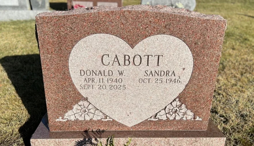 headstone with a heart shaped panel