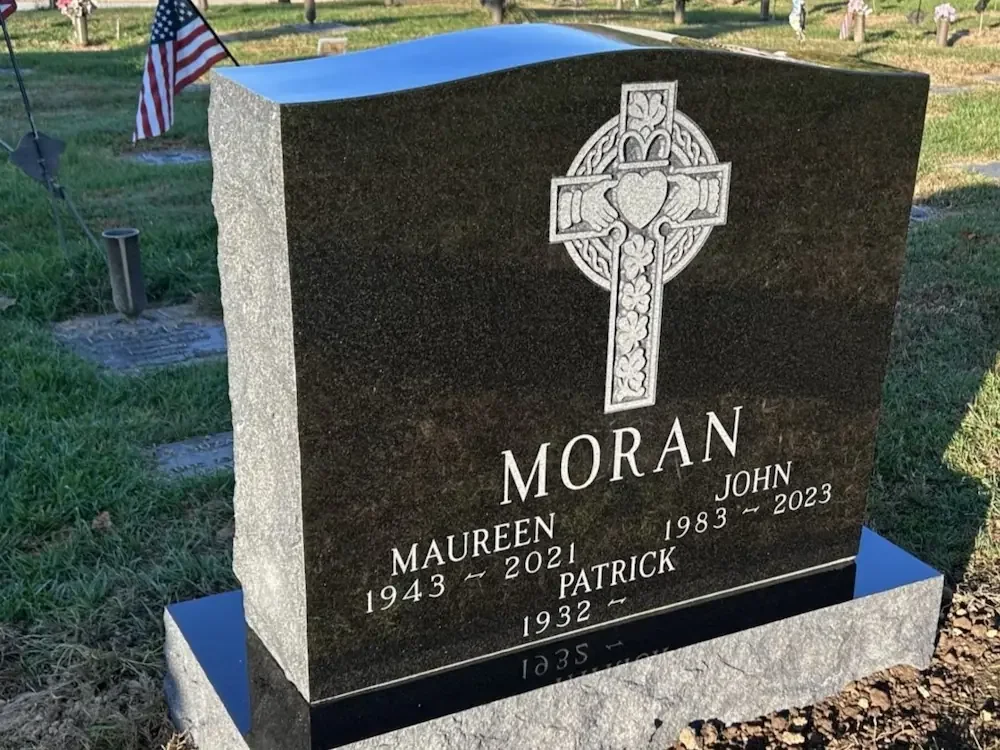 headstone with a polished top and rocky sides
