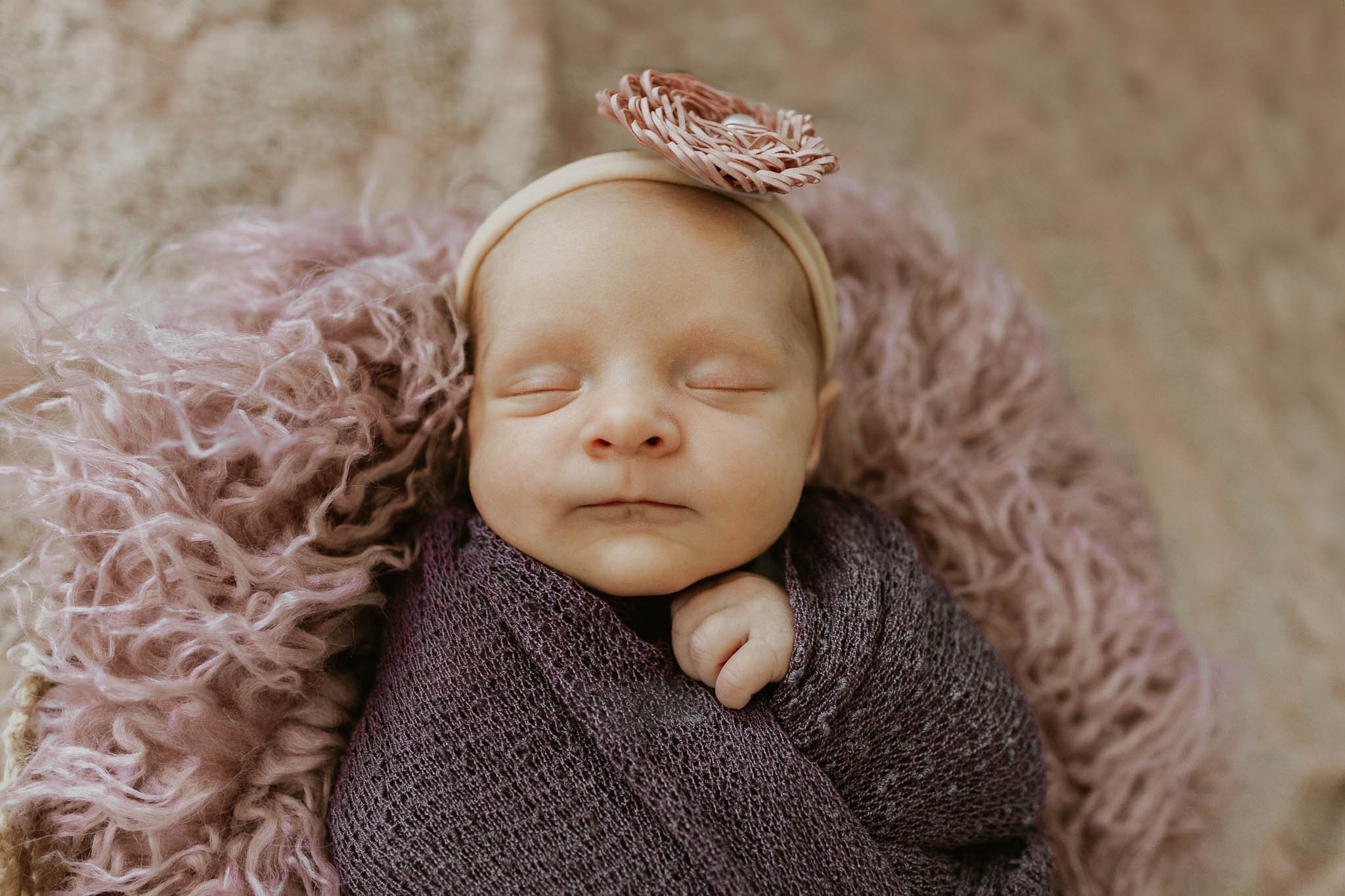 Detail close up of baby girl during her photoshoot with Liz Walsh, Bloomington area newborn photographer.
