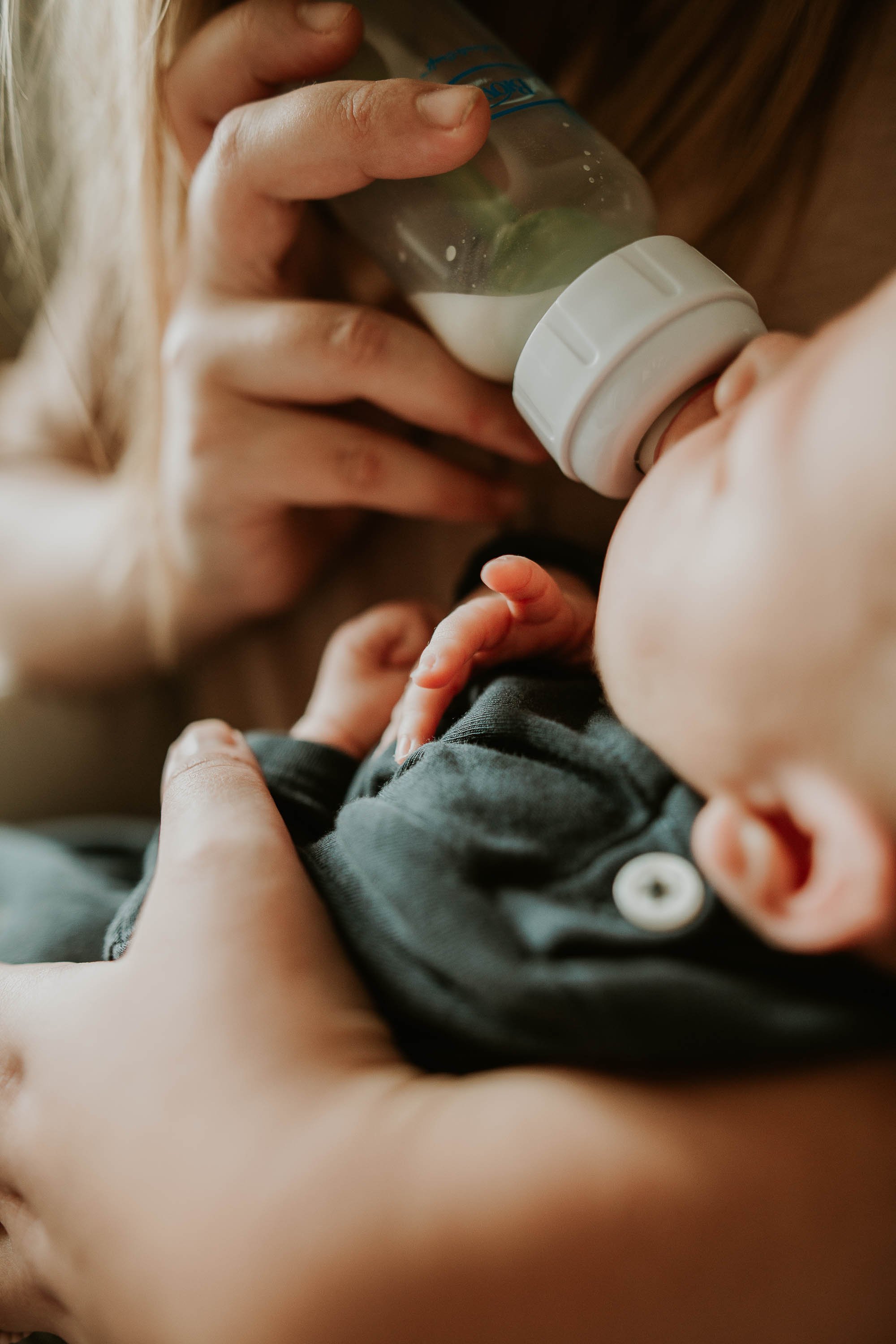 Baby is nearly done with her bottle.