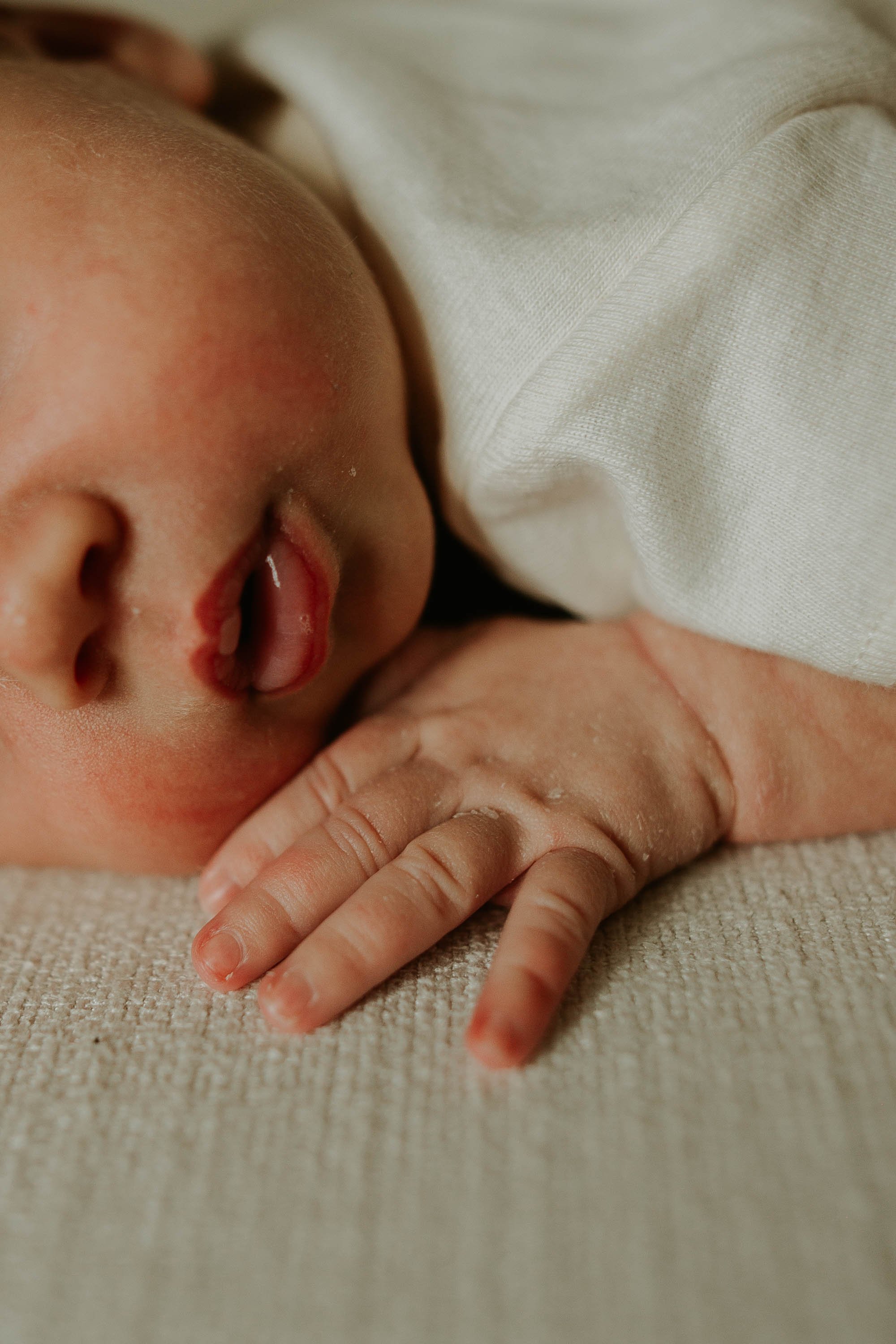 Baby's lips and fingers.