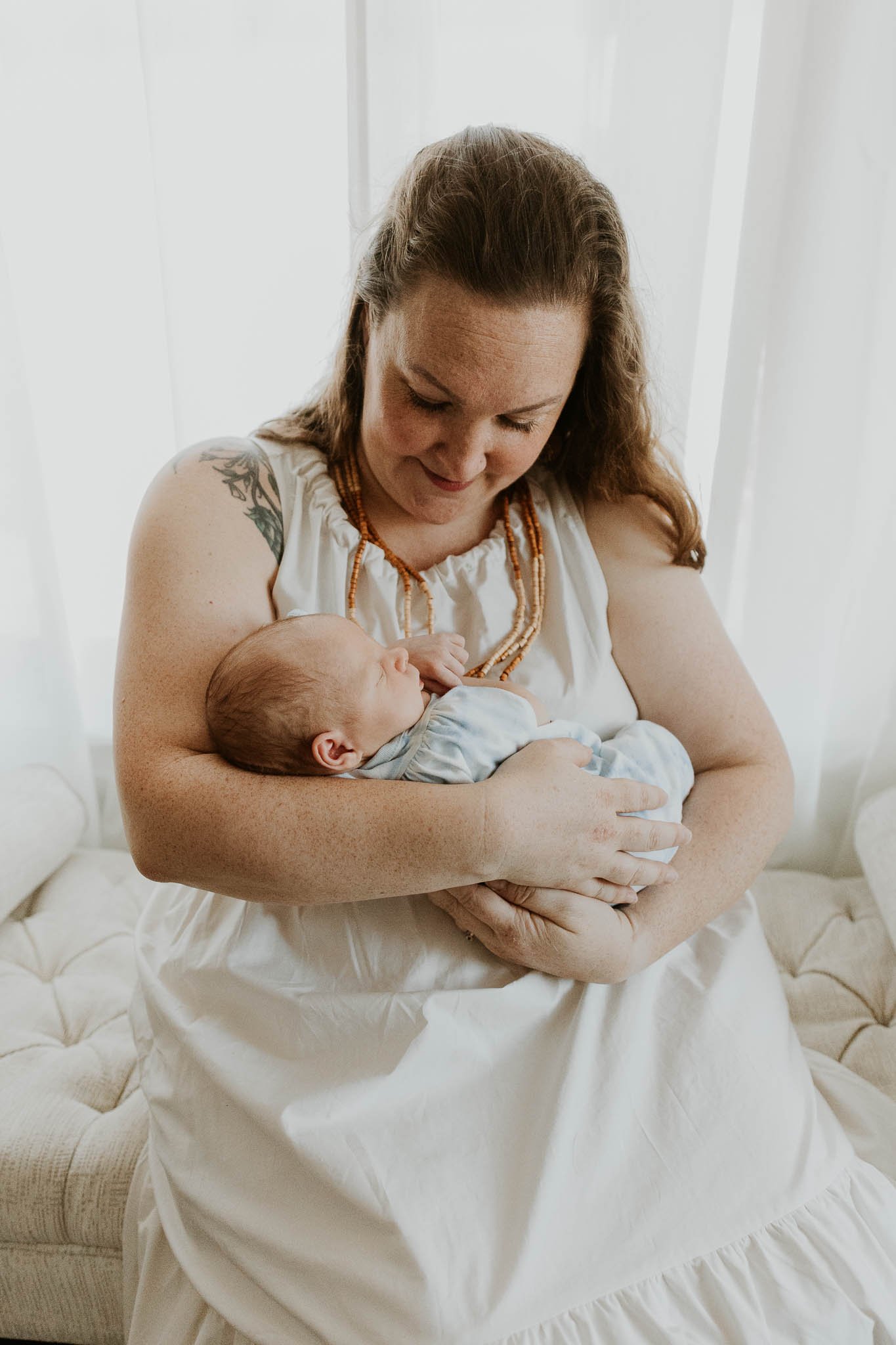 Newborns tend to sleep a lot during their photoshoot.