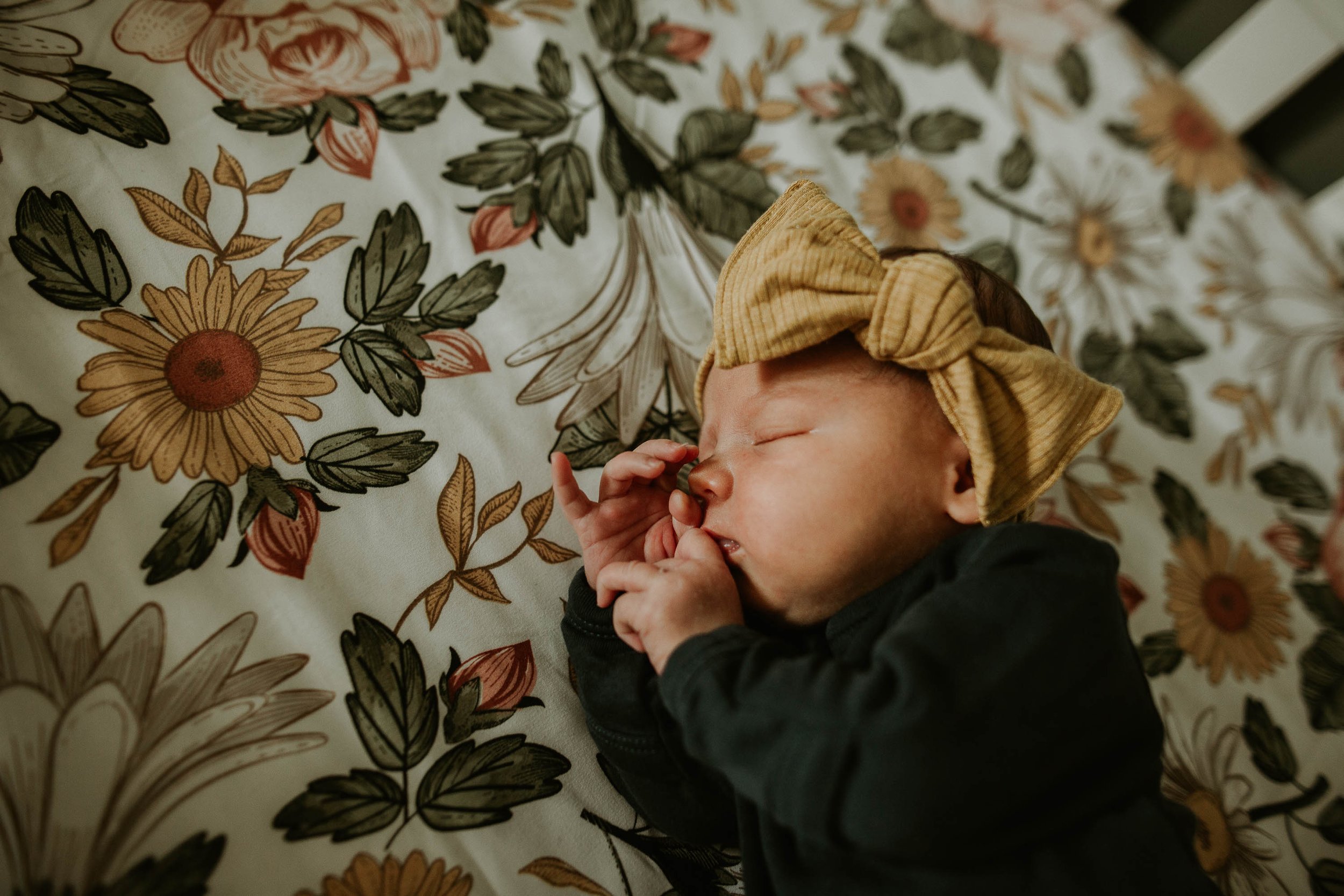 Baby rests peacefully after a full belly.