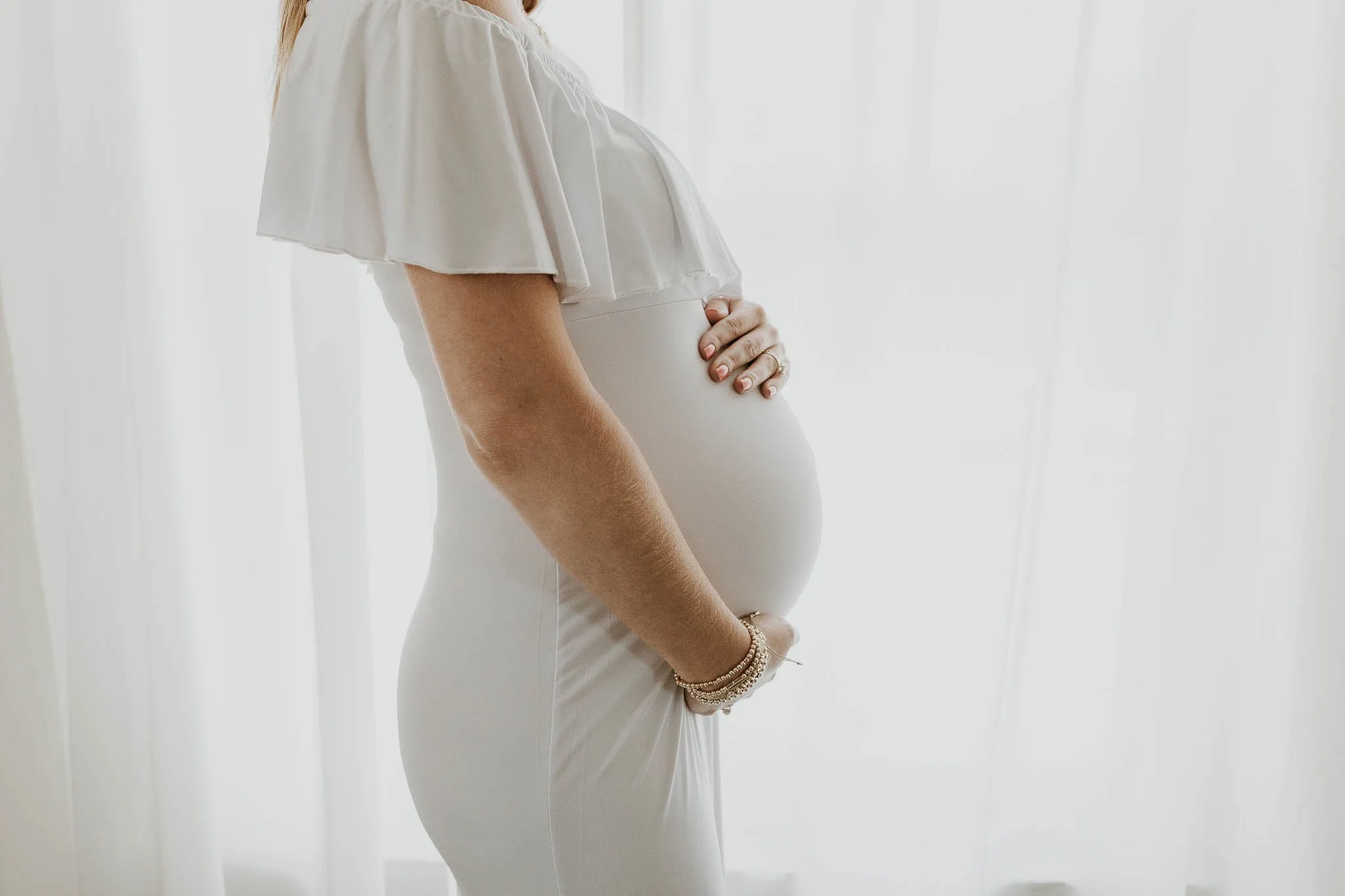 Profile of a pregnant belly