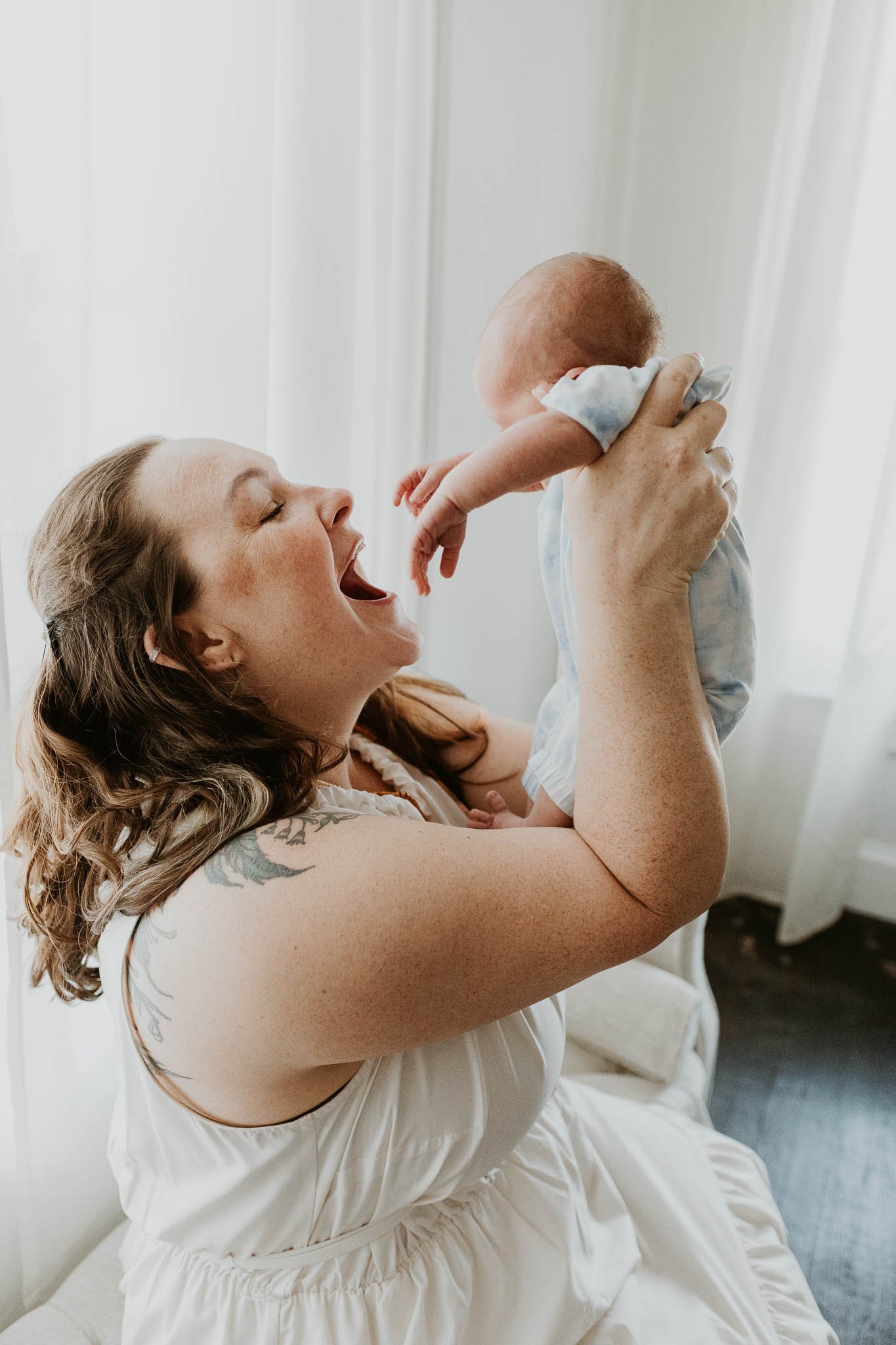 Capturing authentic moments between parents and their babies is Liz Walsh's specialty as a photographer.