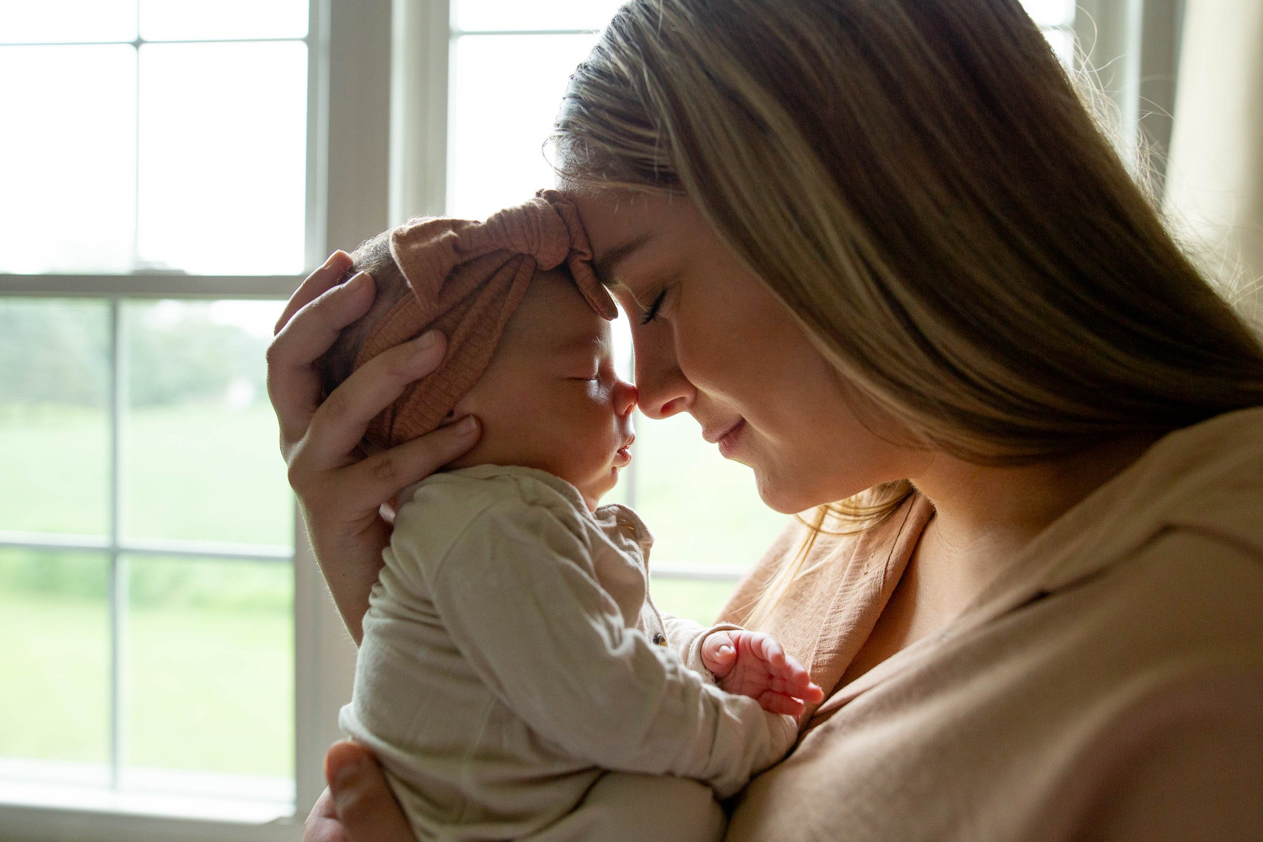 Close up photos of mom and baby are part of this newborn gallery.