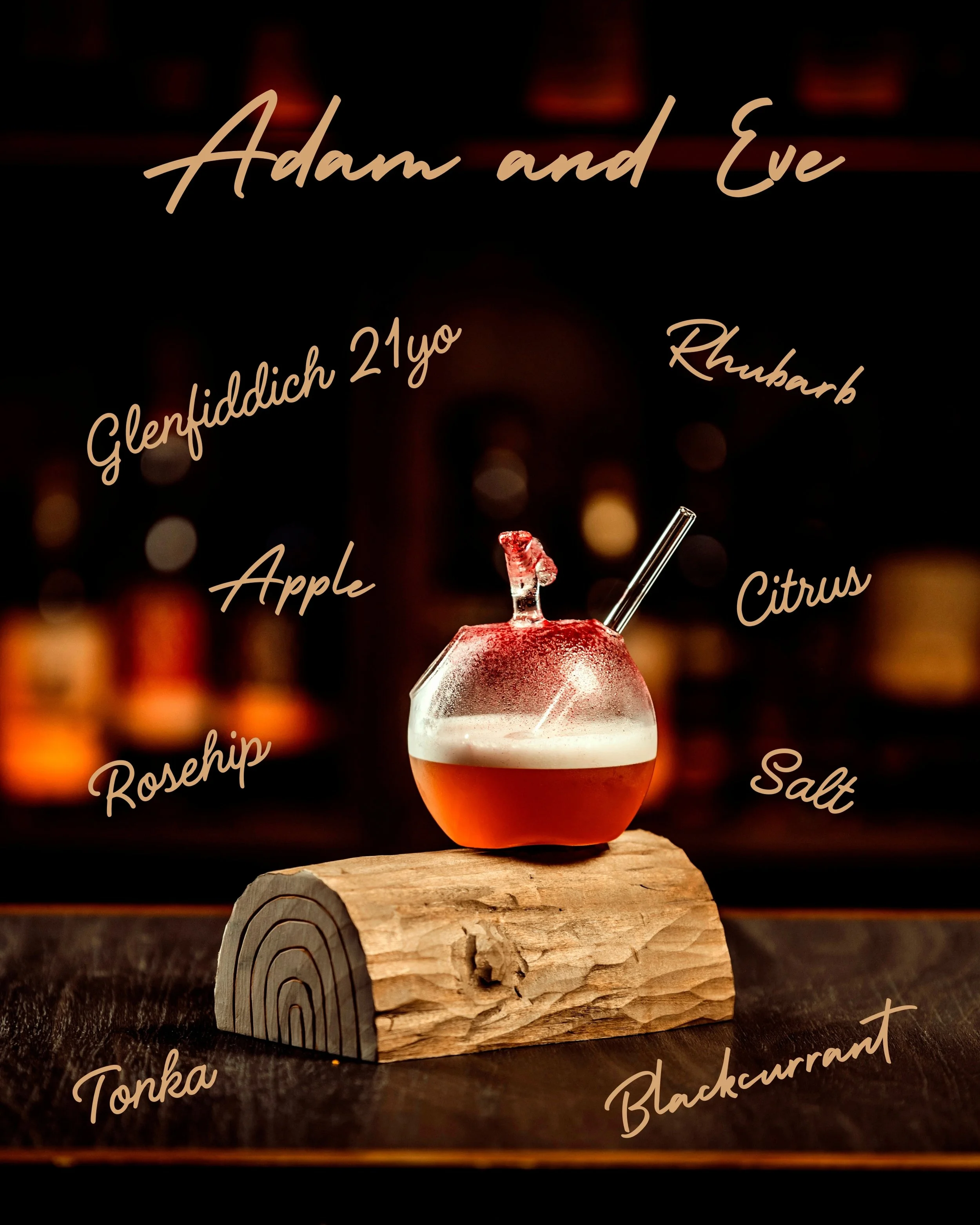 An incredible high-end whisky cocktail served in a glass apple on a log of wood, with a dark background and various cocktail ingredient words floating around.