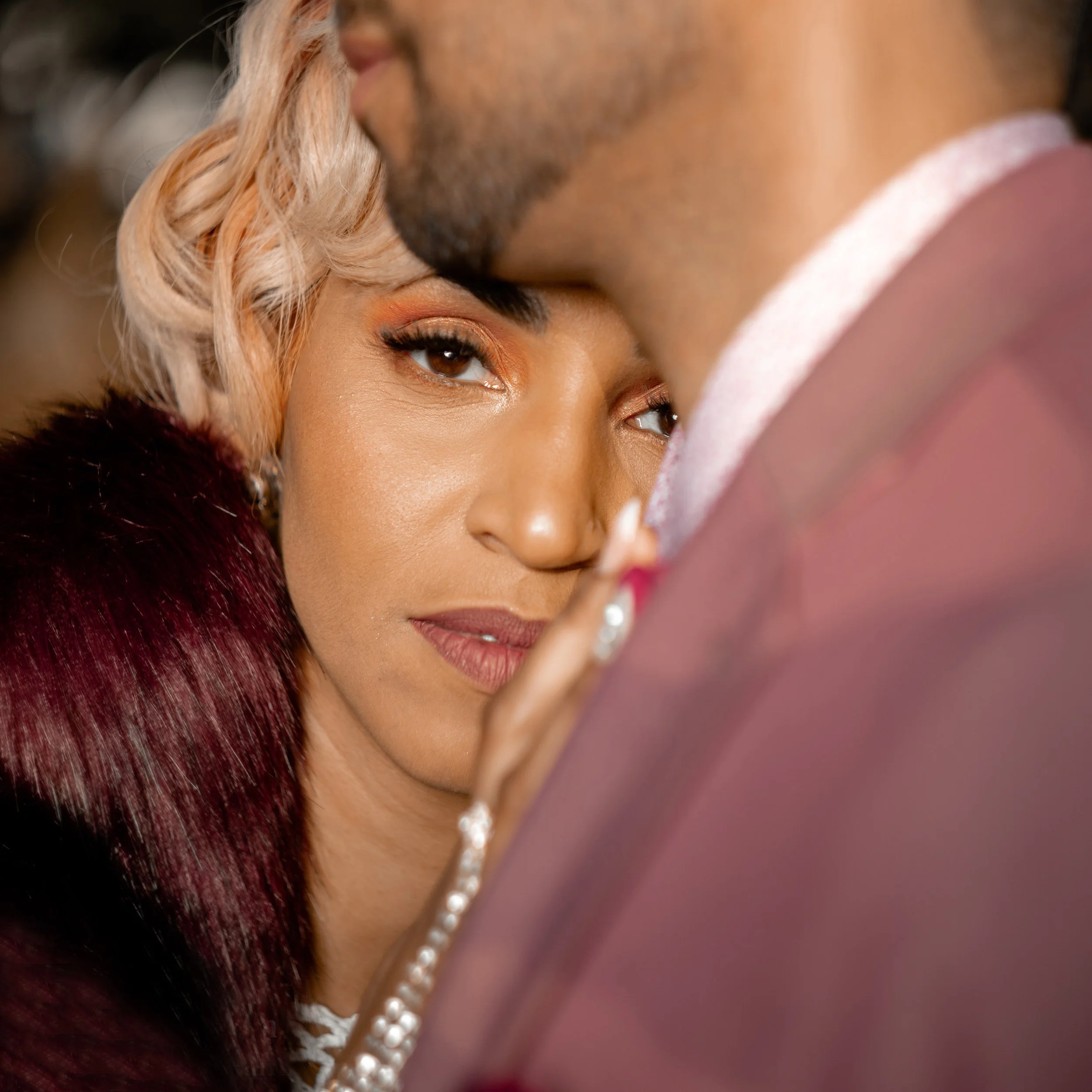 Laurie’s customers, Evan and Kade, running down a mountain after getting married. 