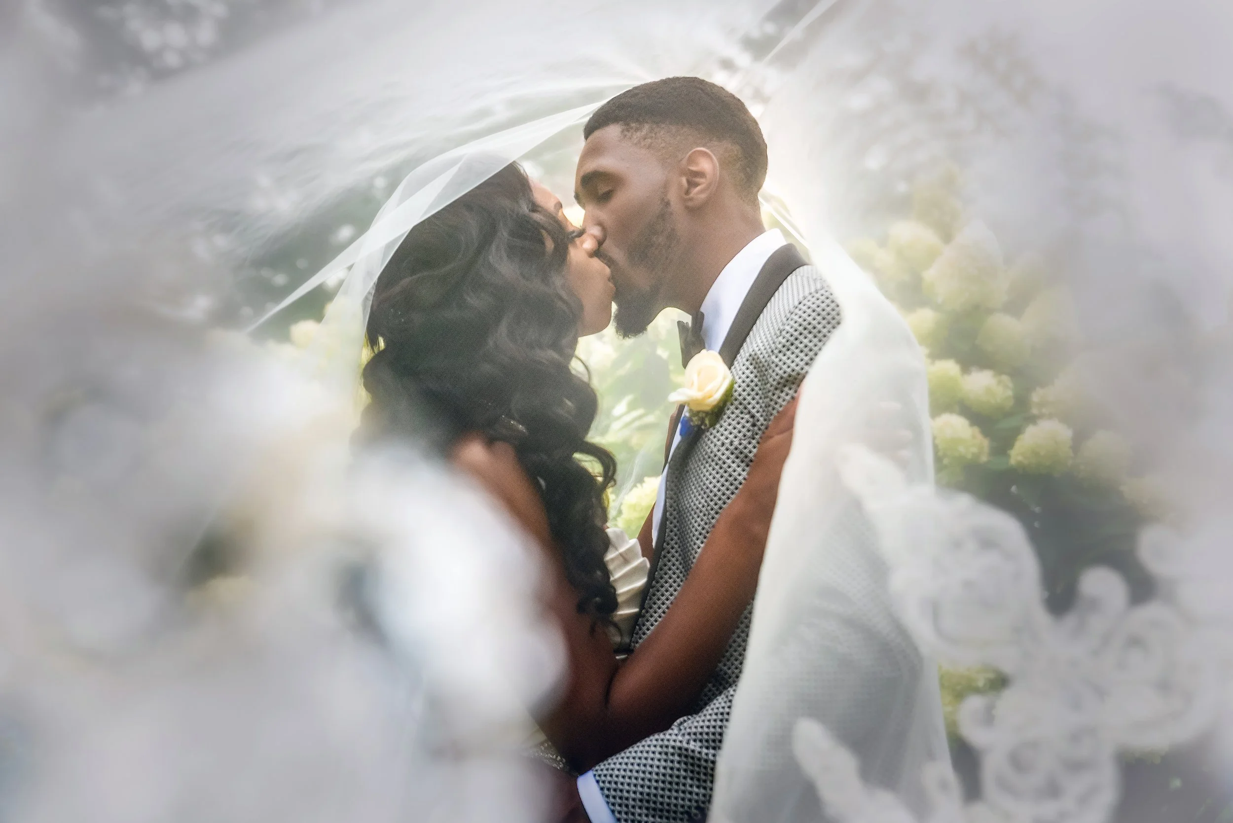 Laurie’s customers, Larissa and Emmett, just married walking off the aisle together.