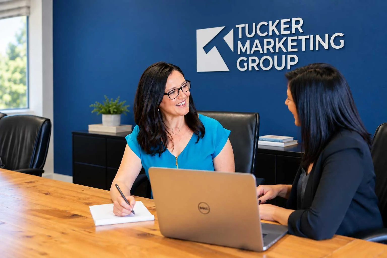 staff meeting at tucker conference table