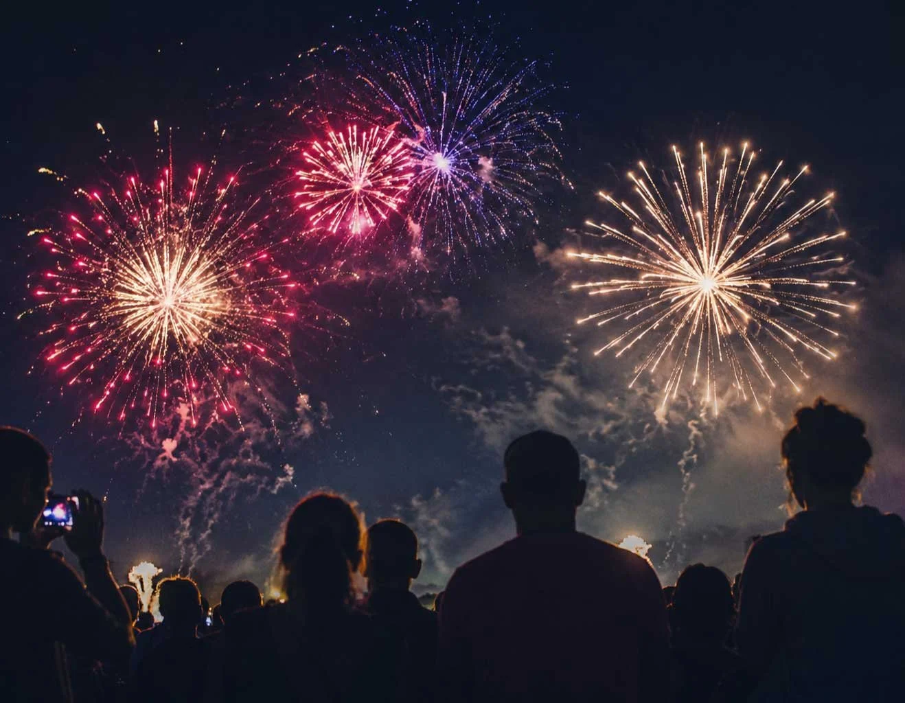 family watching firework display at shelter cove hilton head
