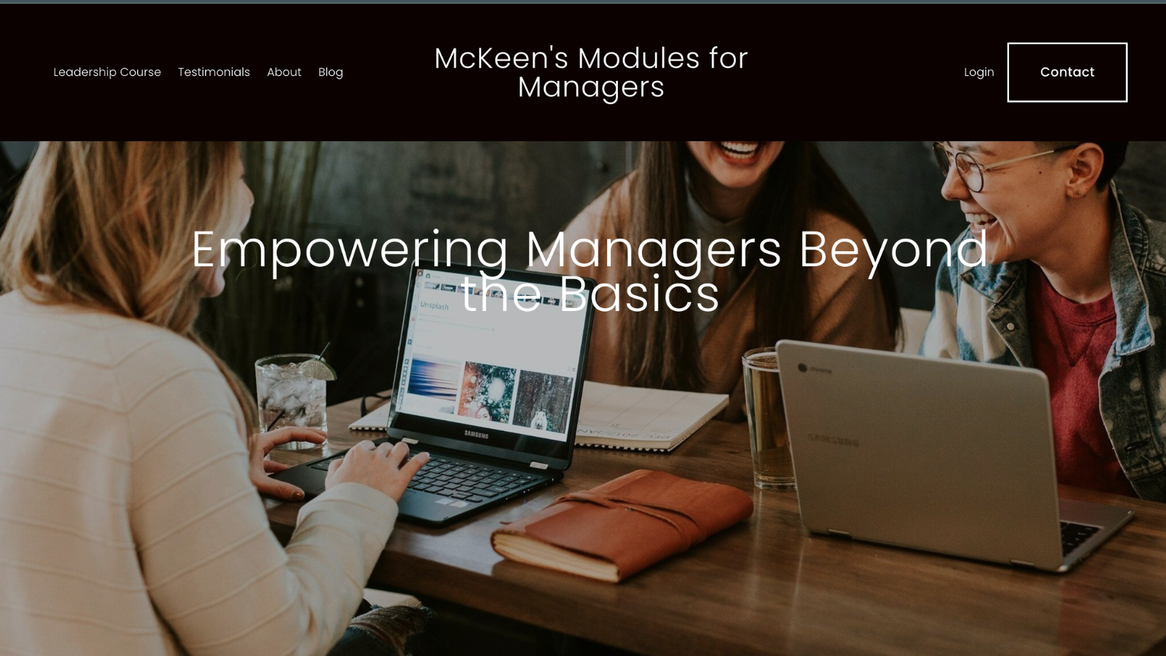 Website homepage for McKeen's Modules for Managers, featuring a group of women working together with laptops at a table, smiling and engaging in discussion.