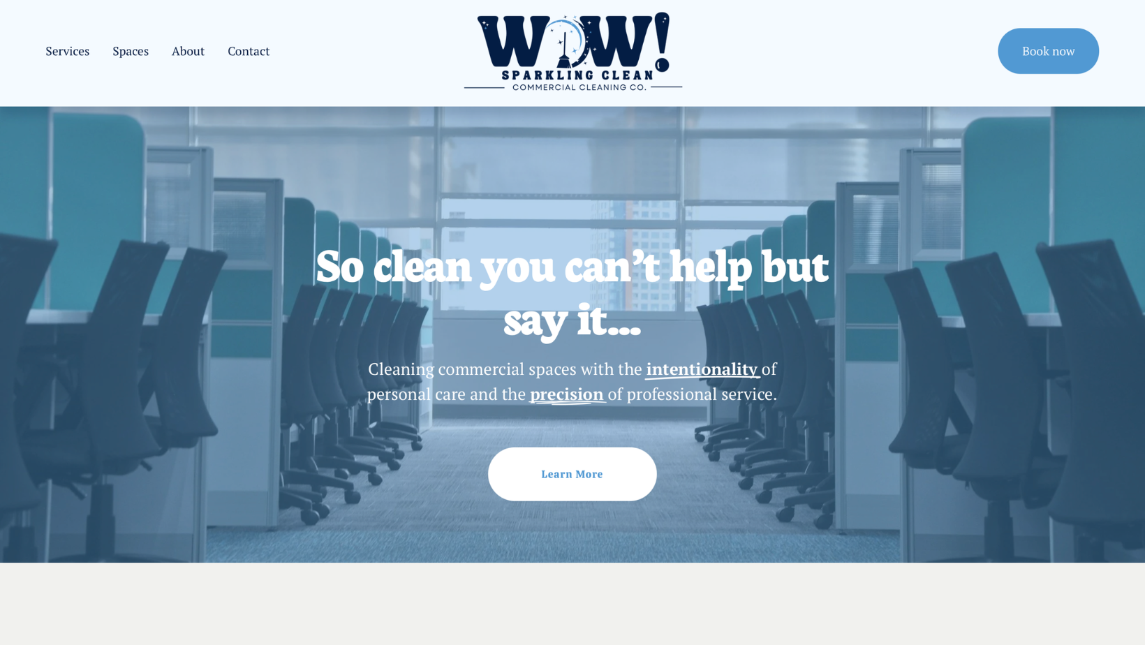 Screenshot of a website homepage for WOW! Sparkling Clean Commercial Cleaning Co. Featuring a background of office workstations and chairs, with a main headline that reads, 'So clean you can't help but say it...' and a call-to-action button labeled 'Learn More' at the center.