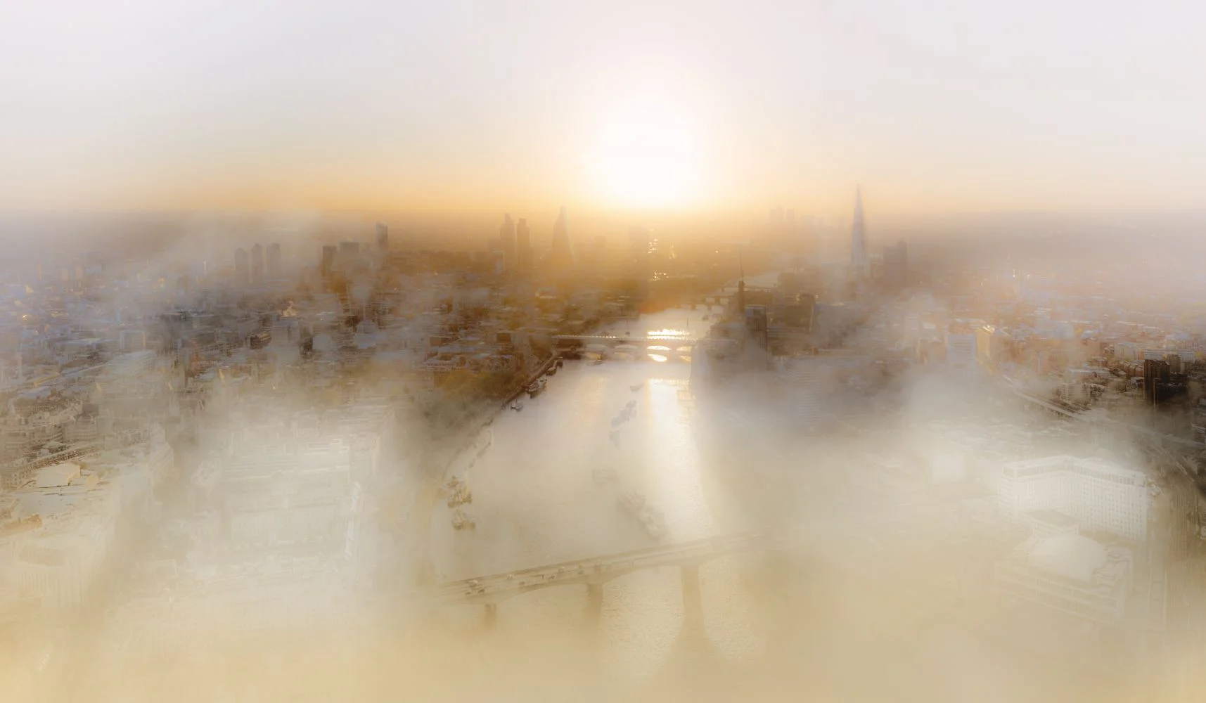 London and the River Thames in early morning mist