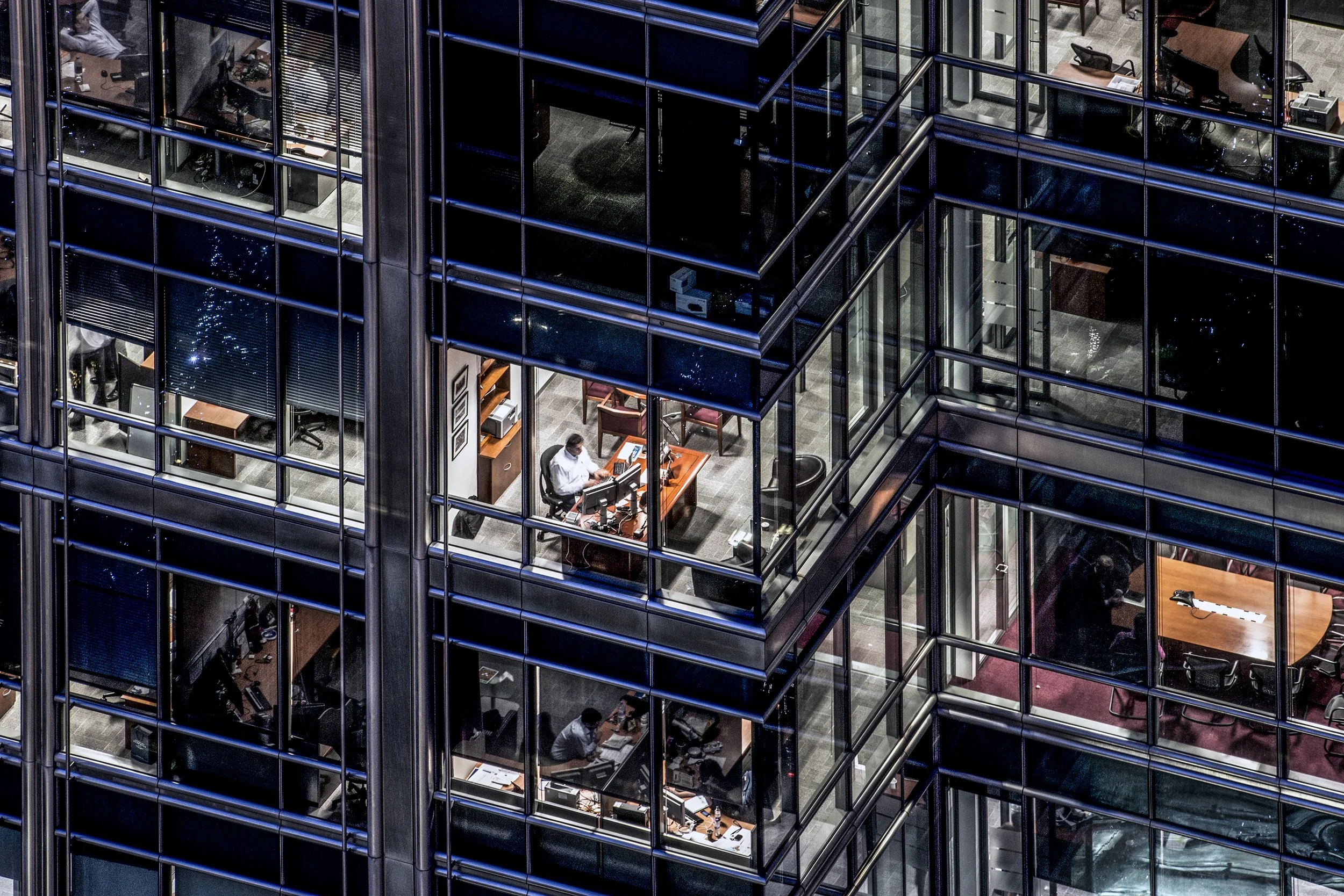lone worker in office building at night