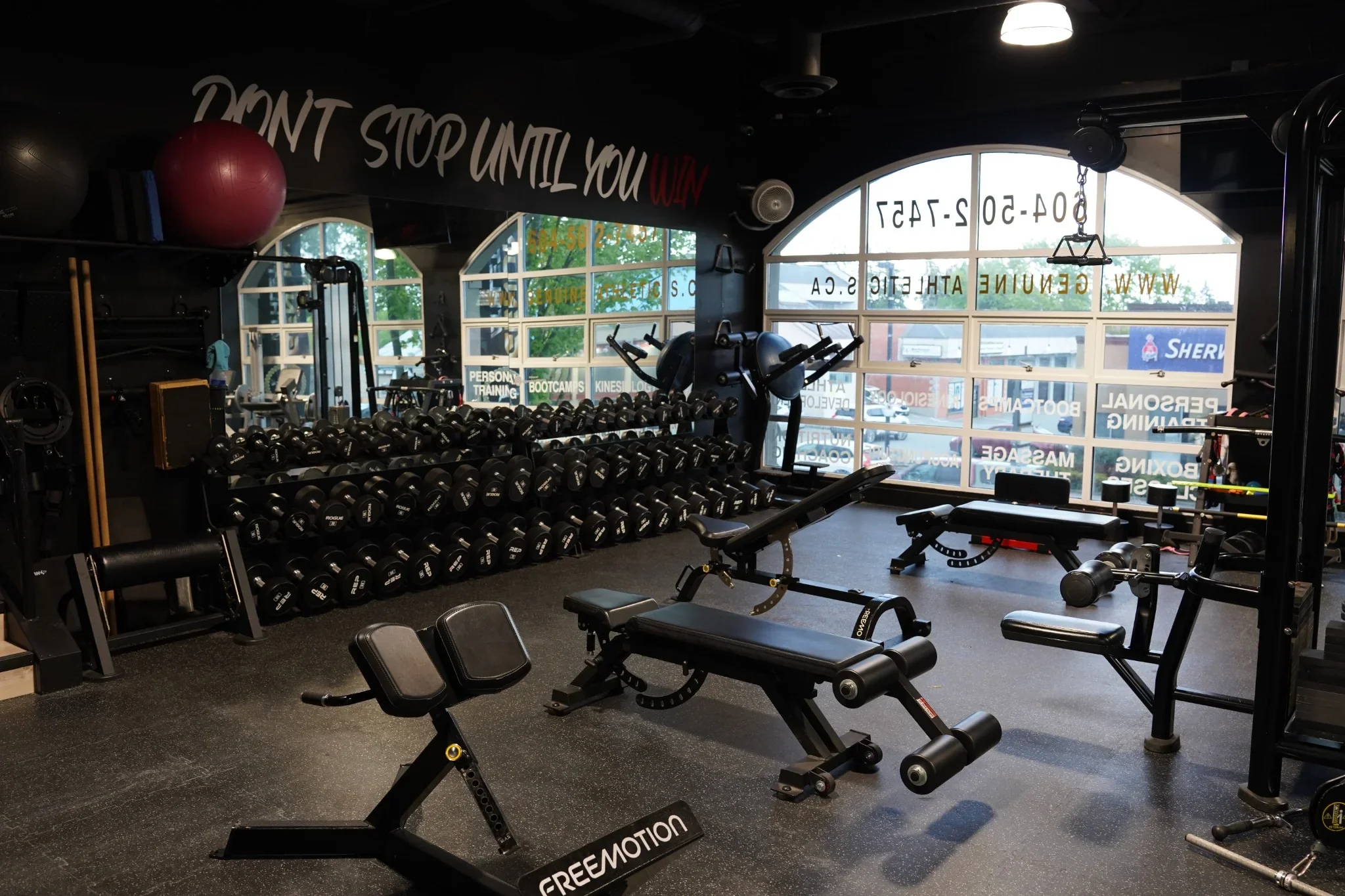 Dumbbell and free-weight training area at Genuine Athletics and Rehabilitation.