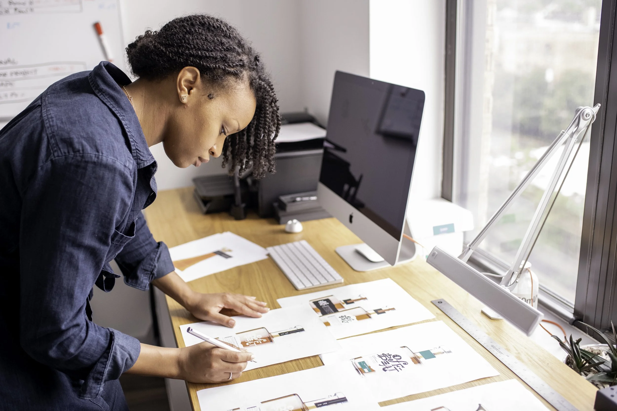 Candace Solola, SO Dsgn Partner & Creative Director. Black owned design studio.