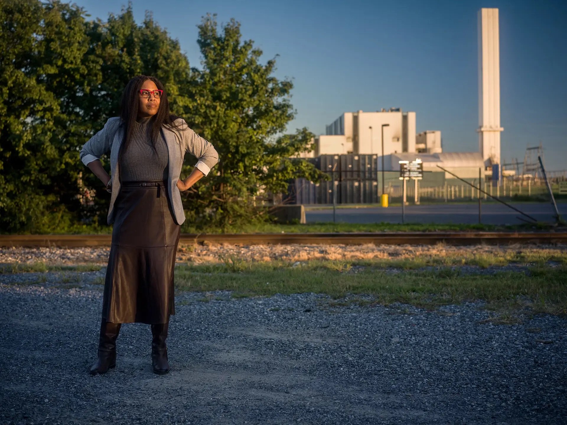 Kearni Warren in front of a waste incinerator in Chester, PA.