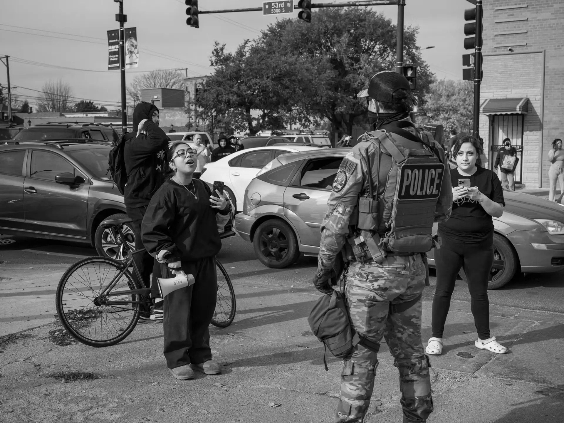 Community members confront federal ICE agents