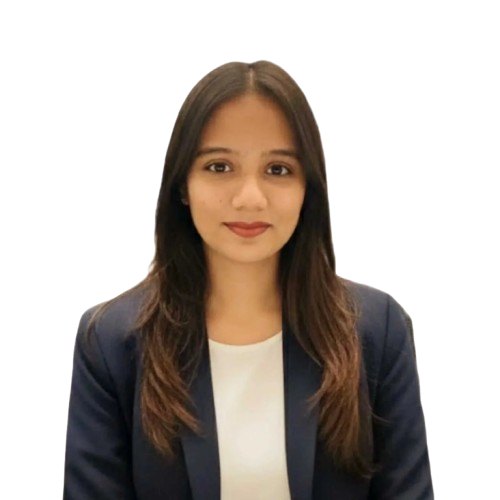 Portrait of a woman with straight dark hair, wearing a colorful floral top, against a plain background.