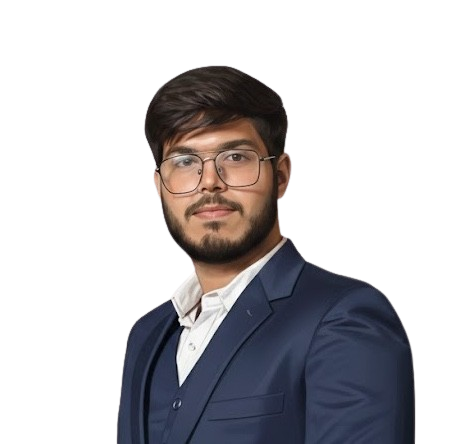 A young man with dark hair, glasses, and a beard, wearing a dark blue blazer and white shirt, posing against a plain background.