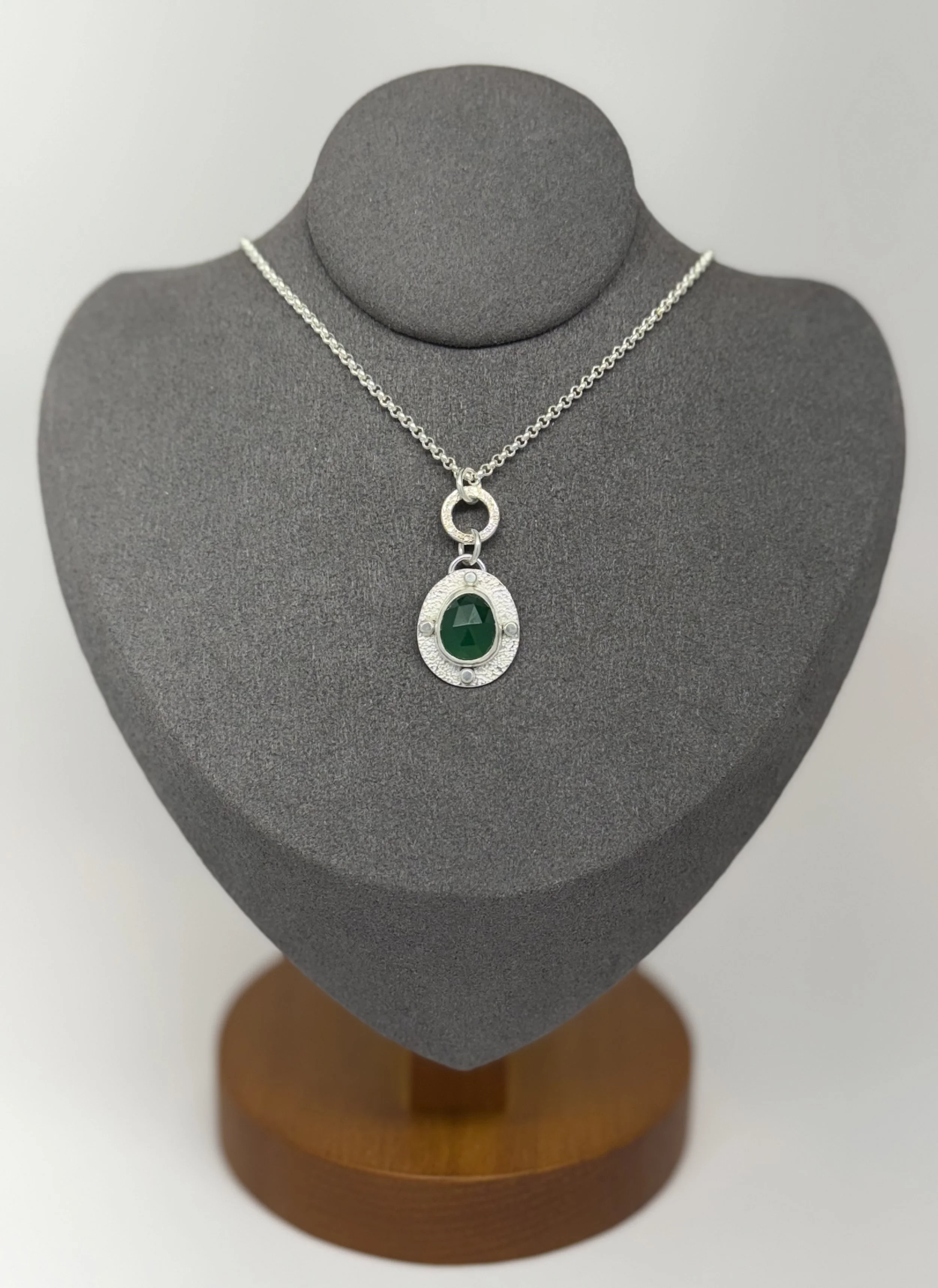 Modern Relic Pendant green onyx on gray stand.jpg