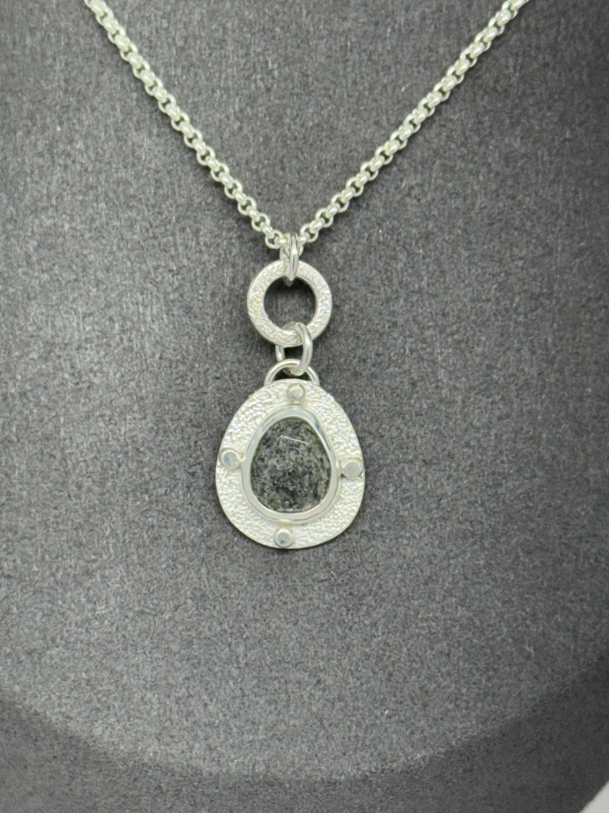Modern Relic Pendant black aventurine on gray stand closeup 2.jpg