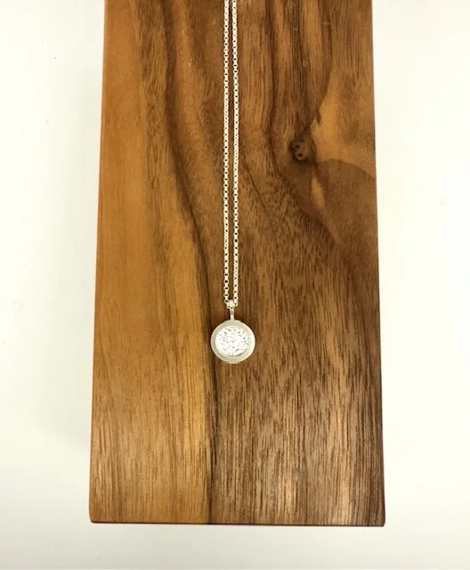 Lumen Silver Pendant- KFinn Designs-lying flat on wood.jpg