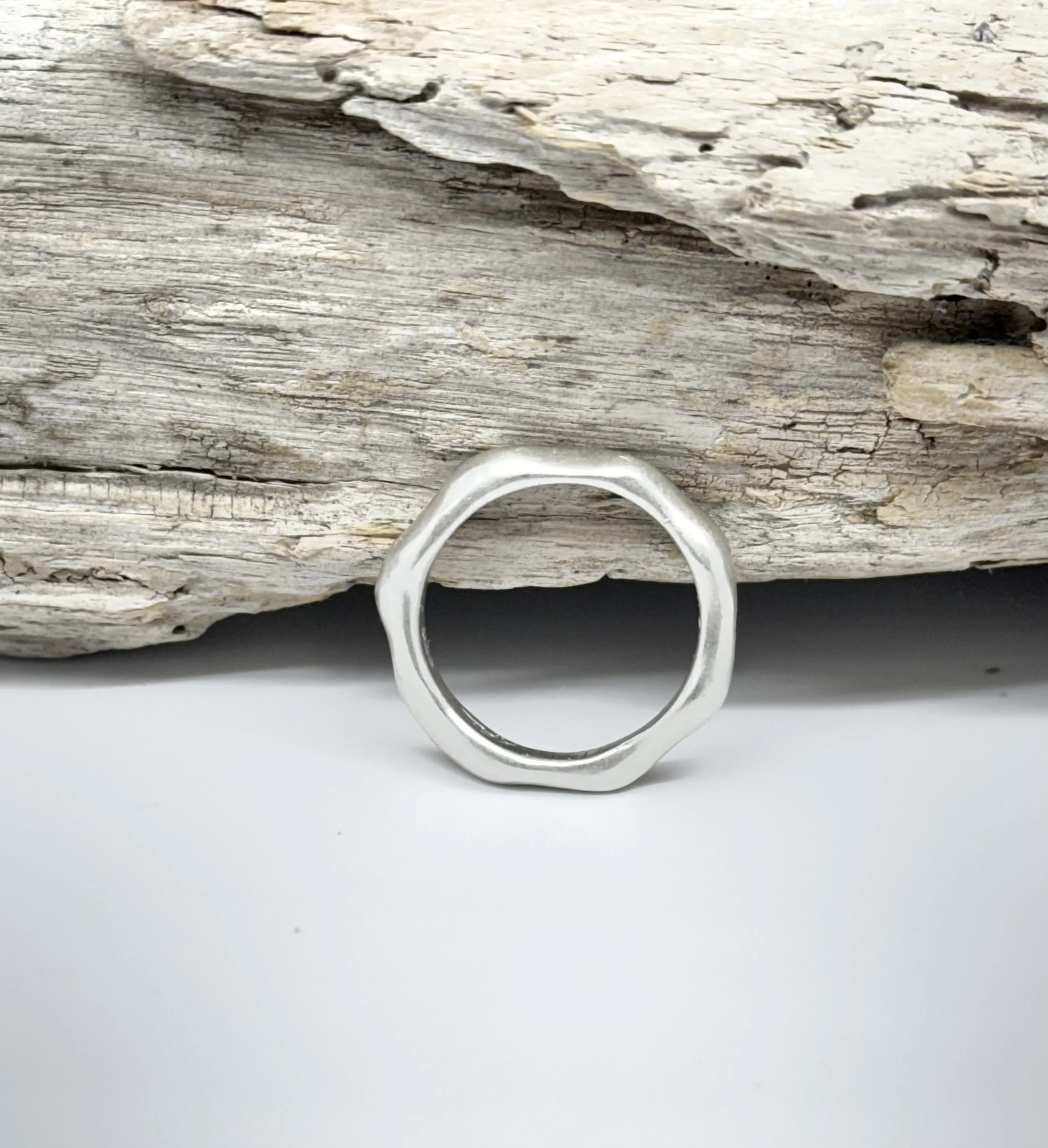 Minimalist silver stacking ring, artisan-made organic band by KFinn Designs