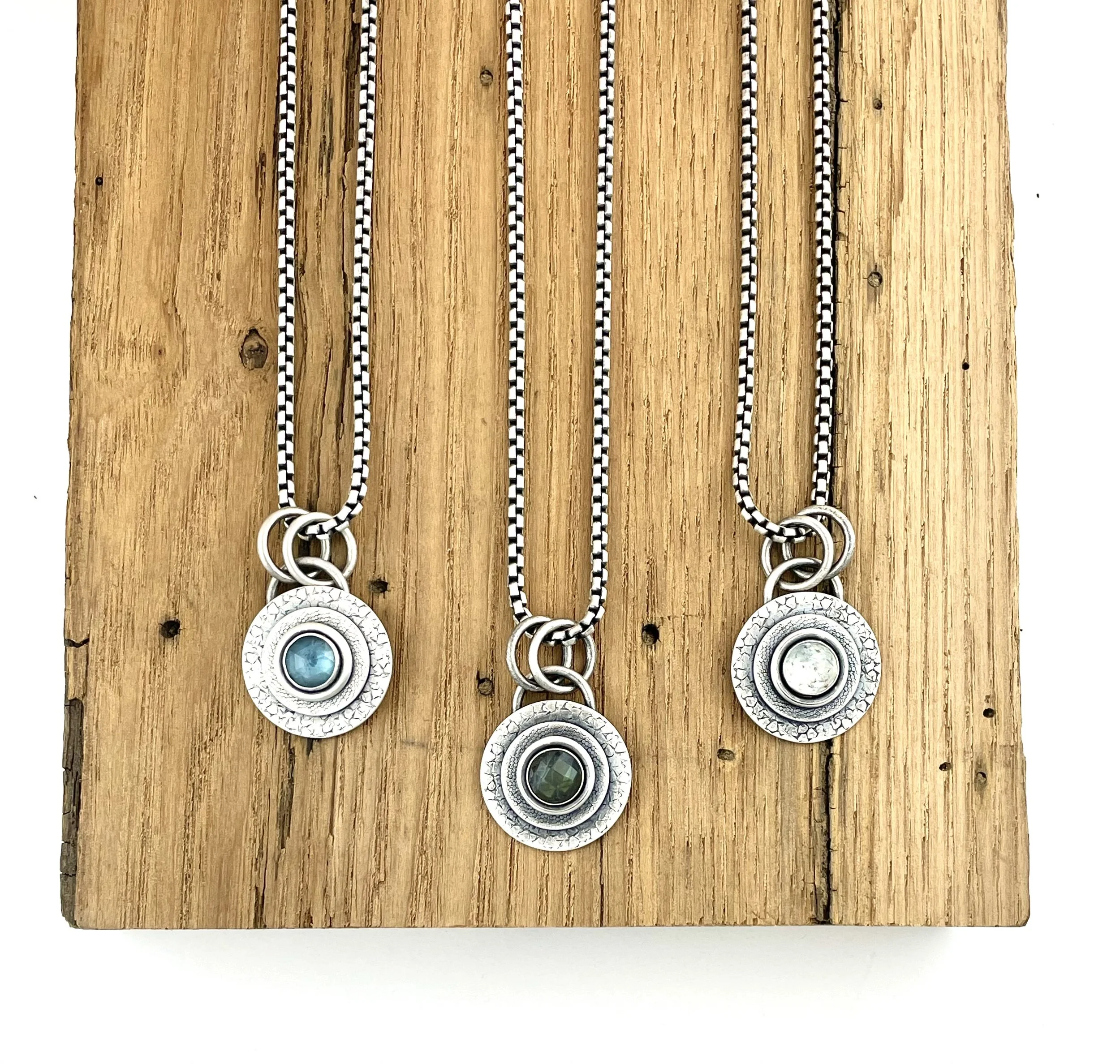 Lg rnd pendants on wood.jpg