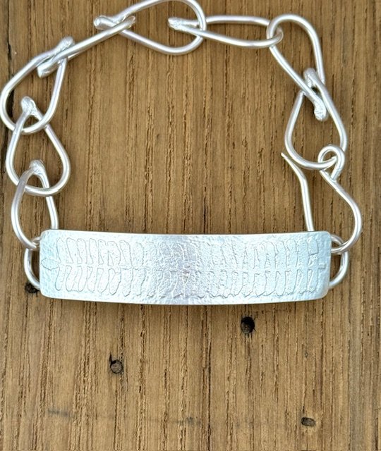Legace Bracelet 2 clasped close up.jpg