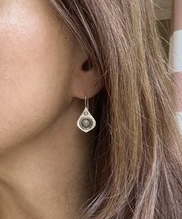 Mini Opulence silver sapphire earring worn to show the scale of the handcrafted sterling silver drop design