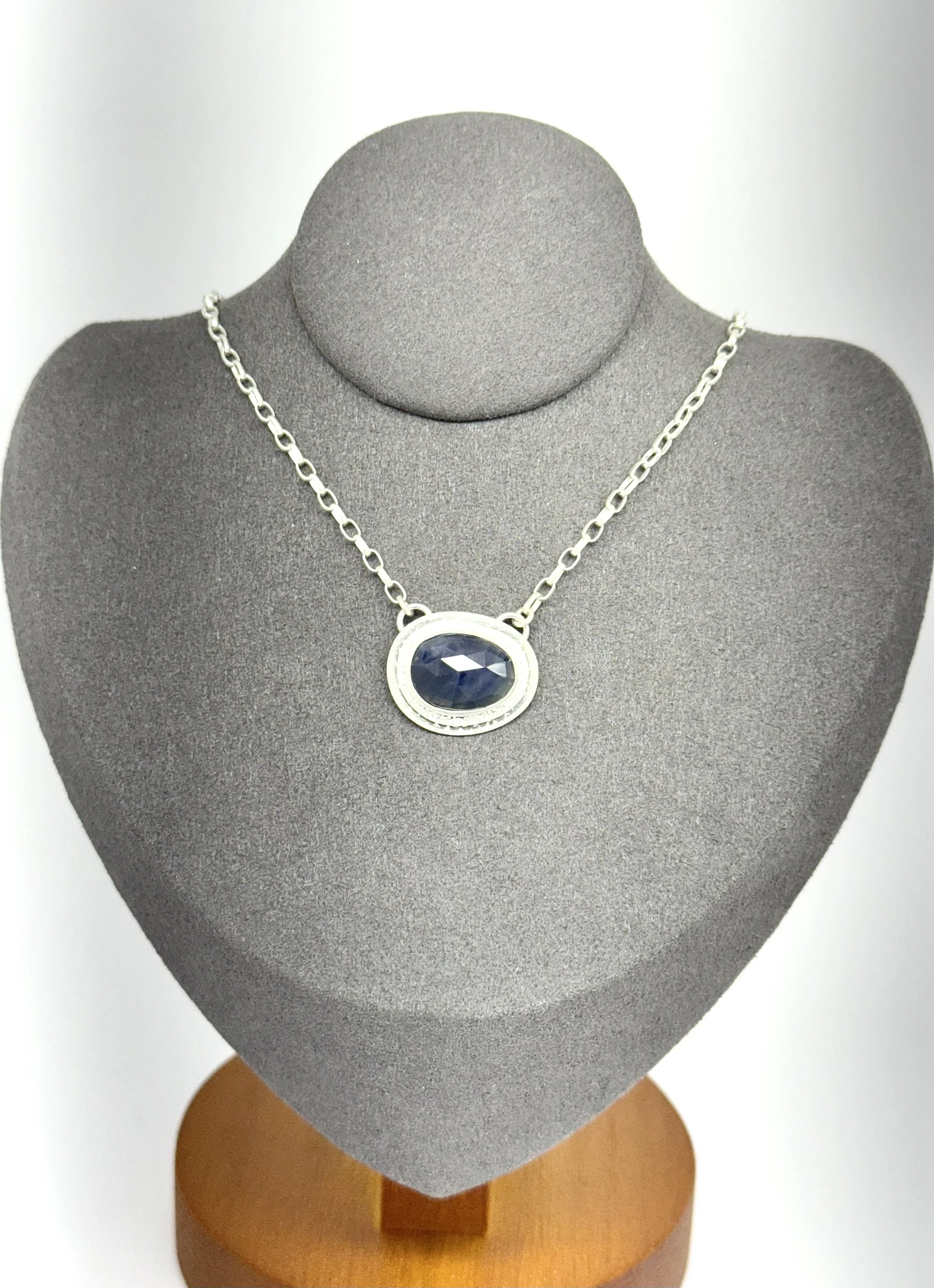 Portal Pendant Sapphire on gray stand.jpg