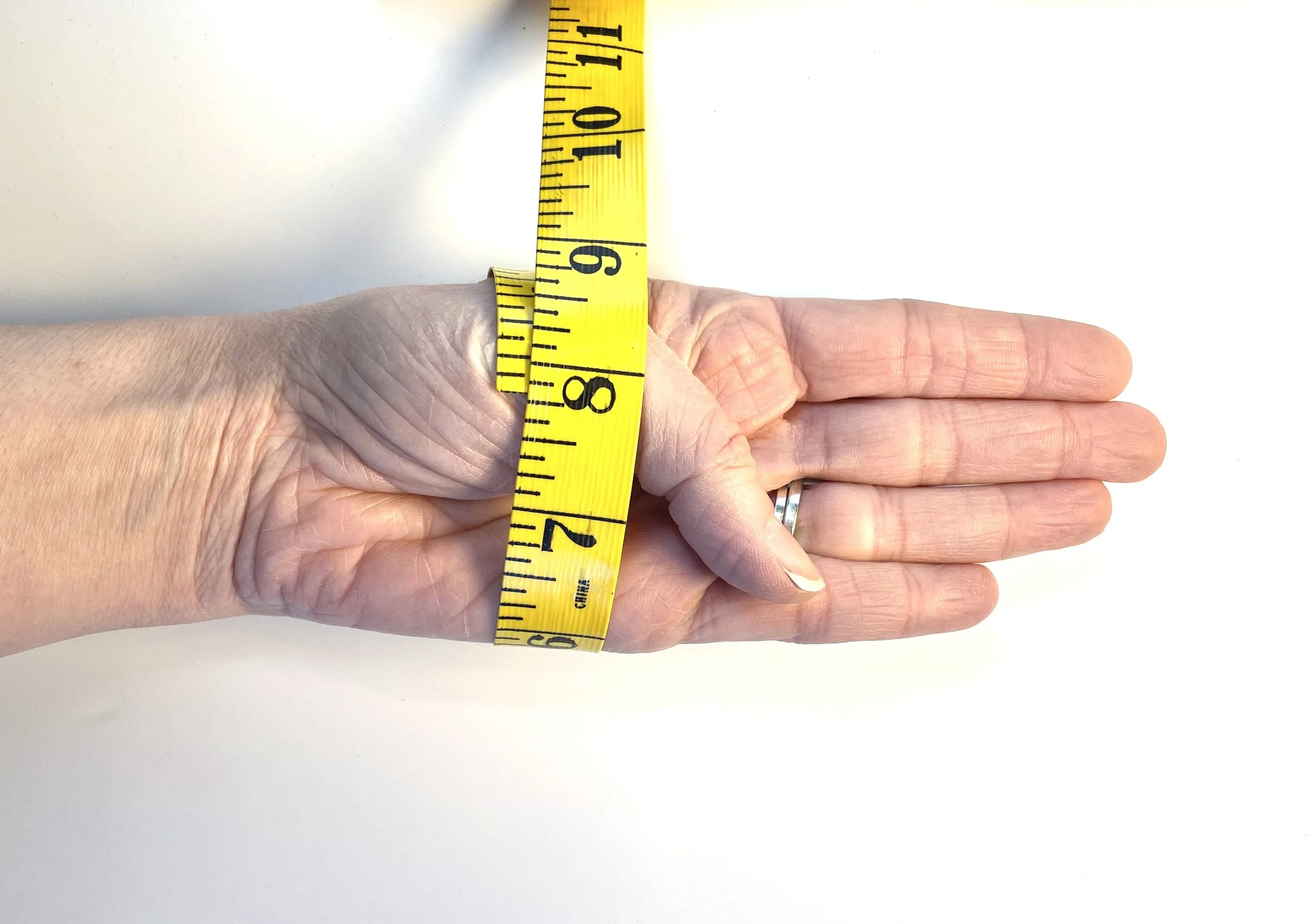 Picture to show how to measure hand for correct bangle sizing.