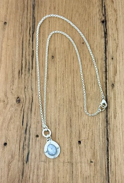 Modern Relic Silver Sapphire lying flat.jpg